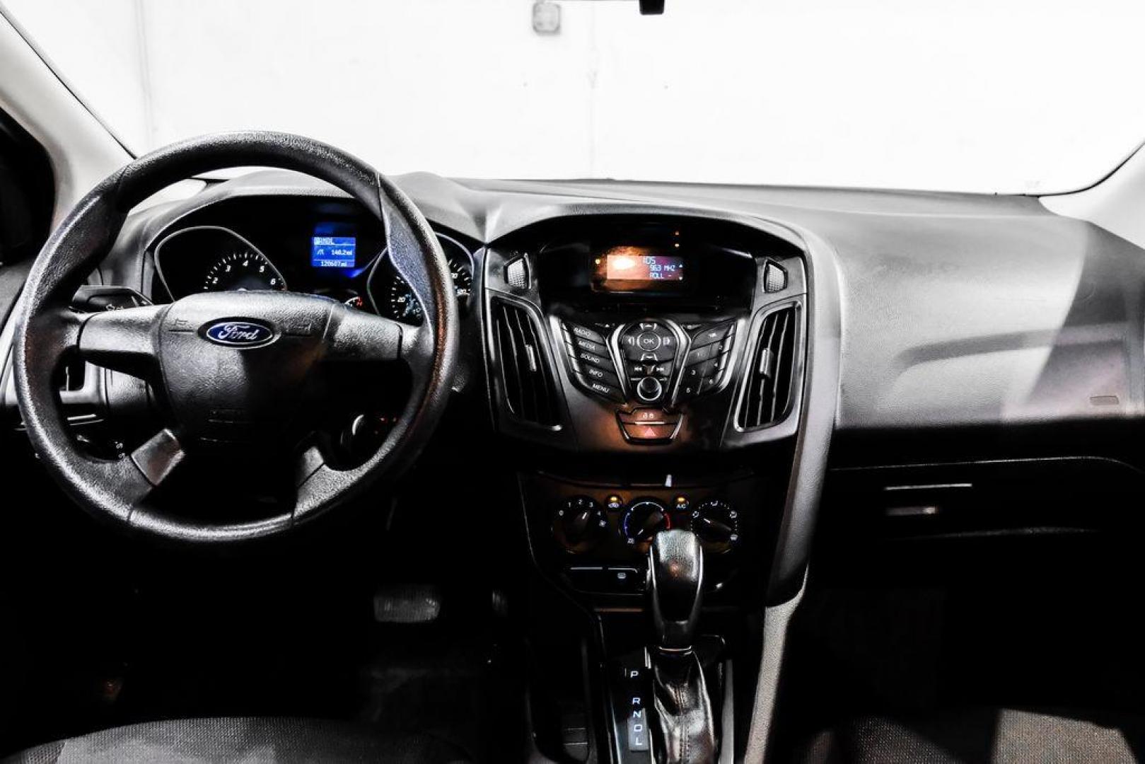 2014 Oxford White /Black Ford Focus S (1FADP3E24EL) with an 2.0L 4-Cylinder DGI Flex Fuel DOHC engine, Automatic transmission, located at 15300 Midway Rd., Addison, TX, 75001, (972) 702-0011, 32.958321, -96.838074 - Photo#14