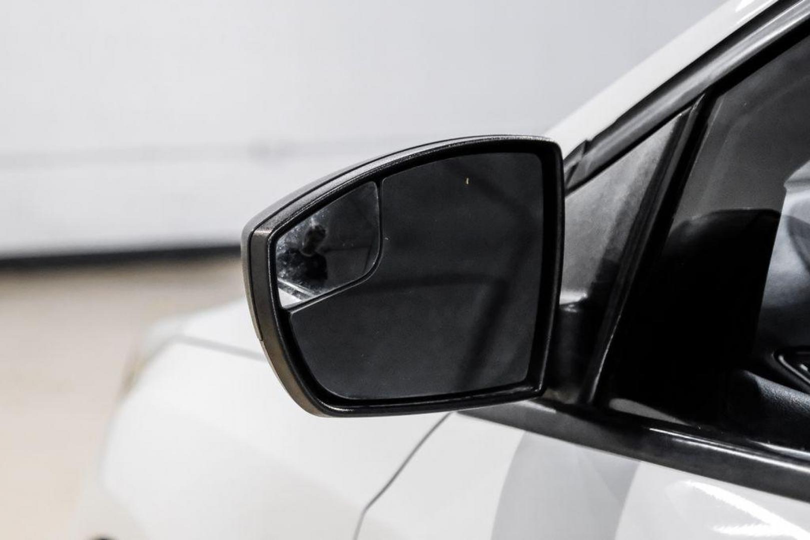 2014 Oxford White /Black Ford Focus S (1FADP3E24EL) with an 2.0L 4-Cylinder DGI Flex Fuel DOHC engine, Automatic transmission, located at 15300 Midway Rd., Addison, TX, 75001, (972) 702-0011, 32.958321, -96.838074 - Photo#31