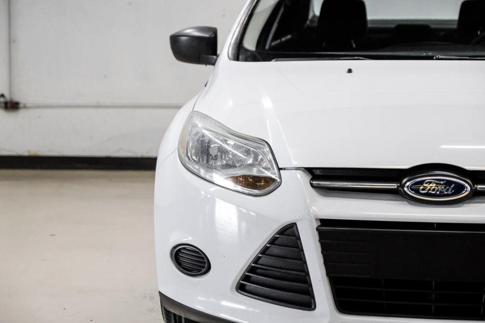 2014 Oxford White /Black Ford Focus S (1FADP3E24EL) with an 2.0L 4-Cylinder DGI Flex Fuel DOHC engine, Automatic transmission, located at 15300 Midway Rd., Addison, TX, 75001, (972) 702-0011, 32.958321, -96.838074 - Photo#37