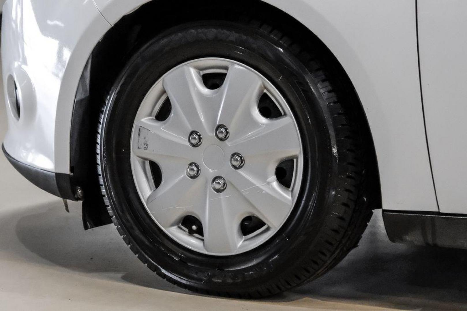 2014 Oxford White /Black Ford Focus S (1FADP3E24EL) with an 2.0L 4-Cylinder DGI Flex Fuel DOHC engine, Automatic transmission, located at 15300 Midway Rd., Addison, TX, 75001, (972) 702-0011, 32.958321, -96.838074 - Photo#43