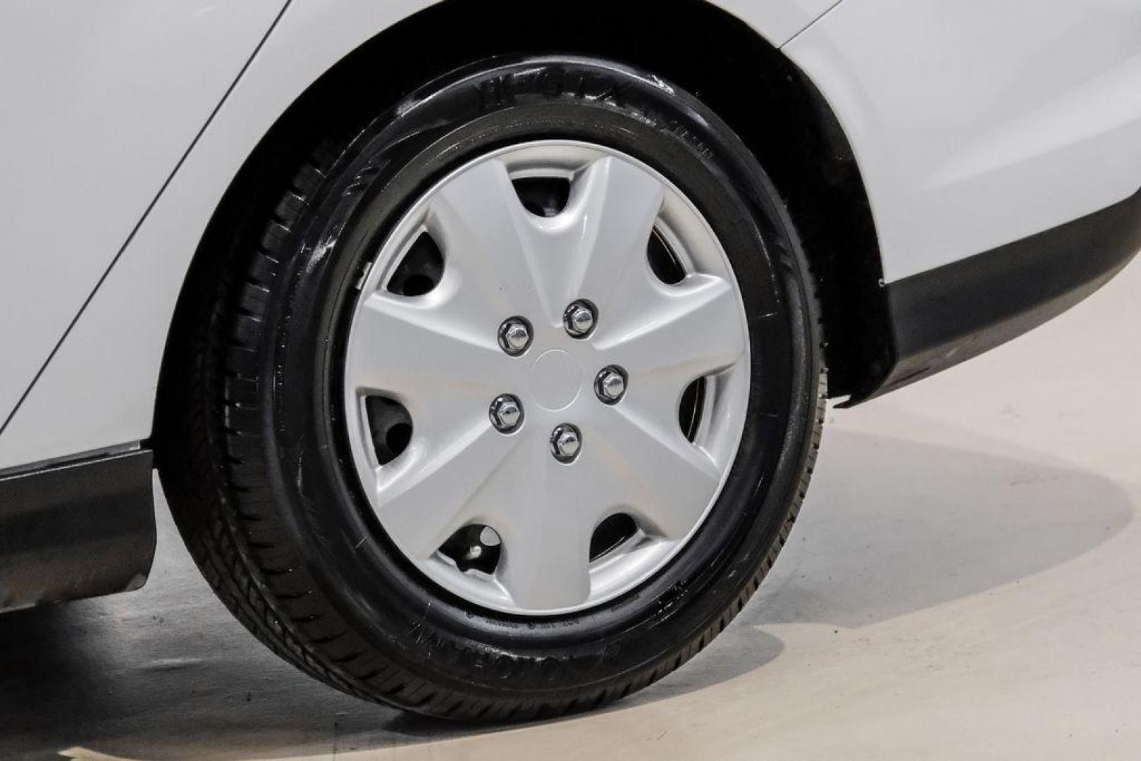 2014 Oxford White /Black Ford Focus S (1FADP3E24EL) with an 2.0L 4-Cylinder DGI Flex Fuel DOHC engine, Automatic transmission, located at 15300 Midway Rd., Addison, TX, 75001, (972) 702-0011, 32.958321, -96.838074 - Photo#44