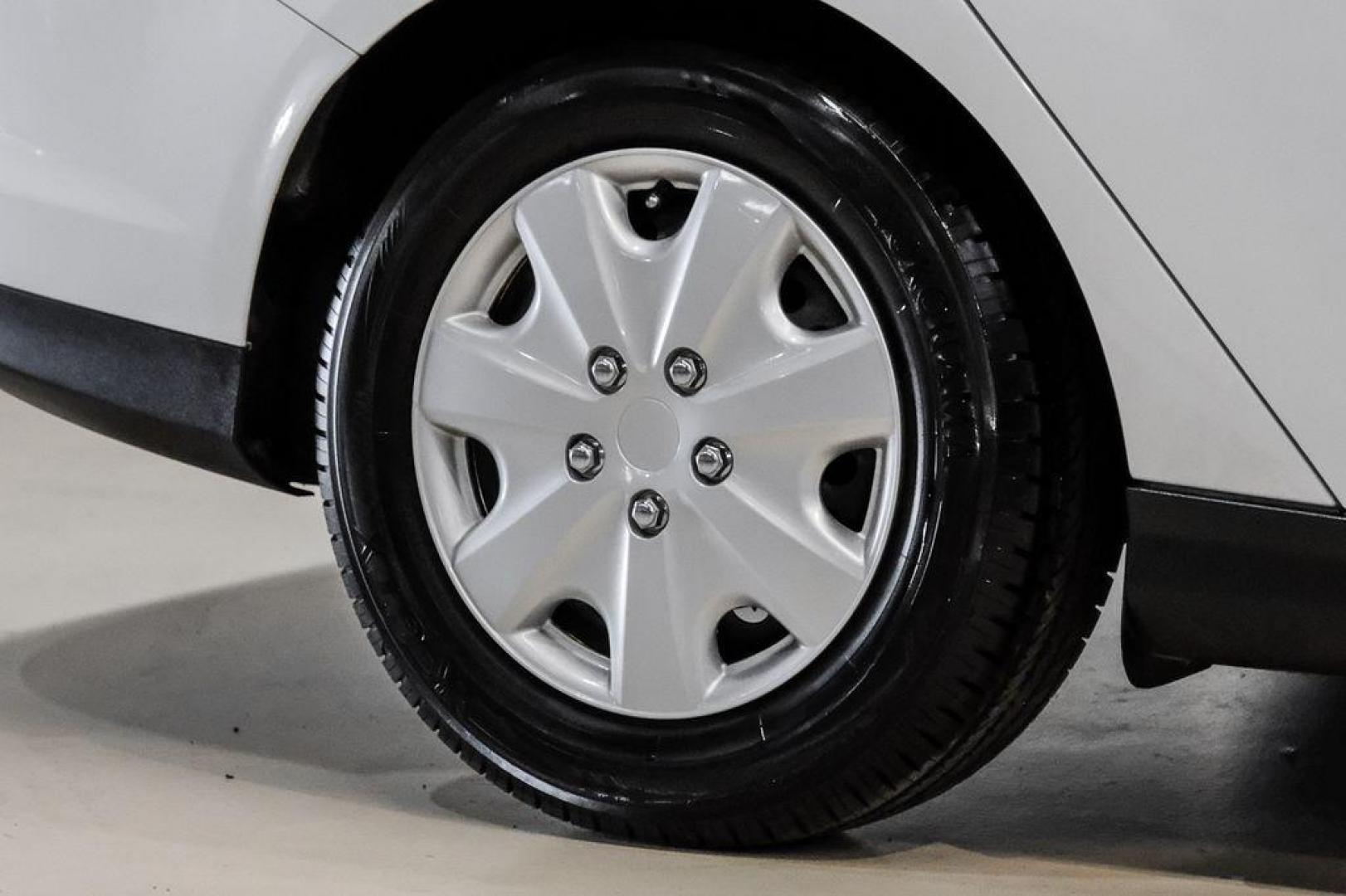 2014 Oxford White /Black Ford Focus S (1FADP3E24EL) with an 2.0L 4-Cylinder DGI Flex Fuel DOHC engine, Automatic transmission, located at 15300 Midway Rd., Addison, TX, 75001, (972) 702-0011, 32.958321, -96.838074 - Photo#45