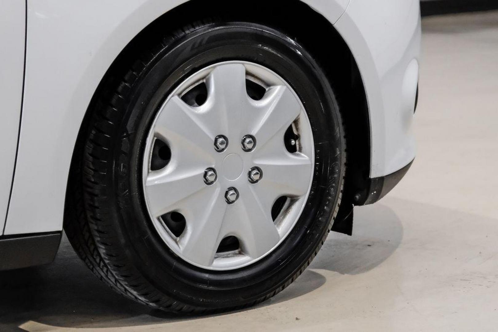 2014 Oxford White /Black Ford Focus S (1FADP3E24EL) with an 2.0L 4-Cylinder DGI Flex Fuel DOHC engine, Automatic transmission, located at 15300 Midway Rd., Addison, TX, 75001, (972) 702-0011, 32.958321, -96.838074 - Photo#46