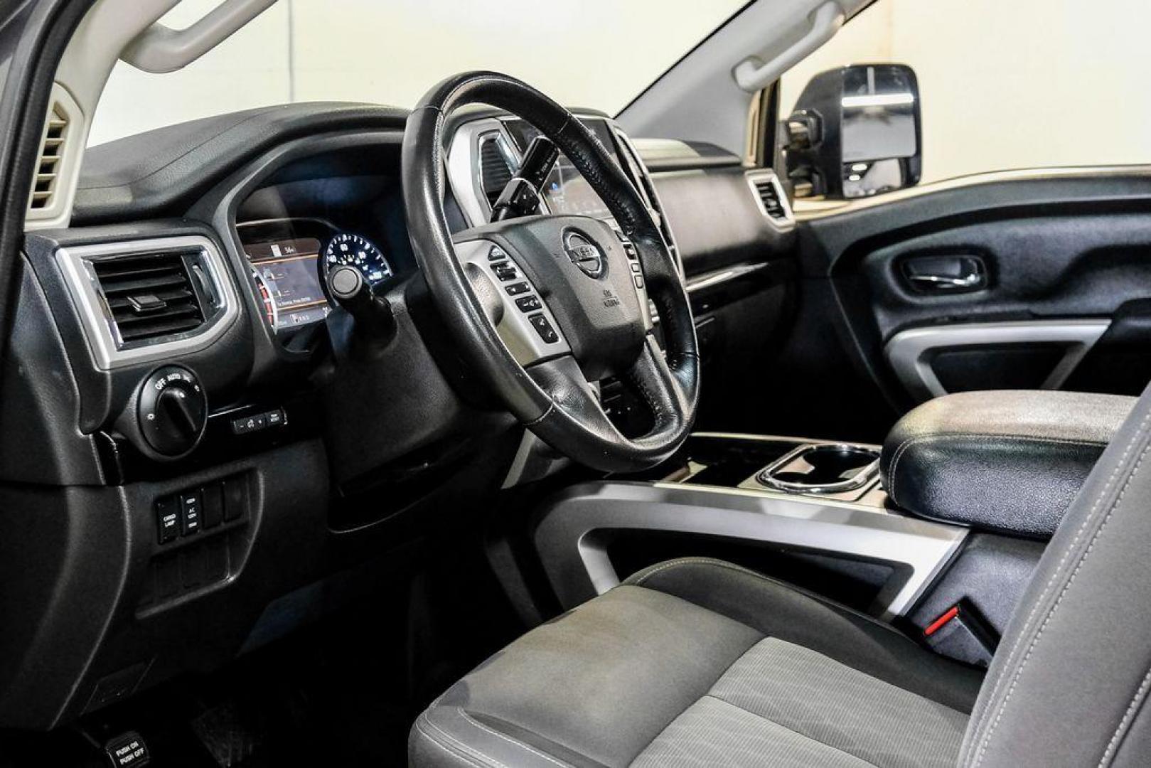 2021 Gun Metallic /Black Nissan Titan SV (1N6AA1ED4MN) with an 5.6L V8 DOHC 32V 400hp engine, Automatic transmission, located at 15300 Midway Rd., Addison, TX, 75001, (972) 702-0011, 32.958321, -96.838074 - Photo#2