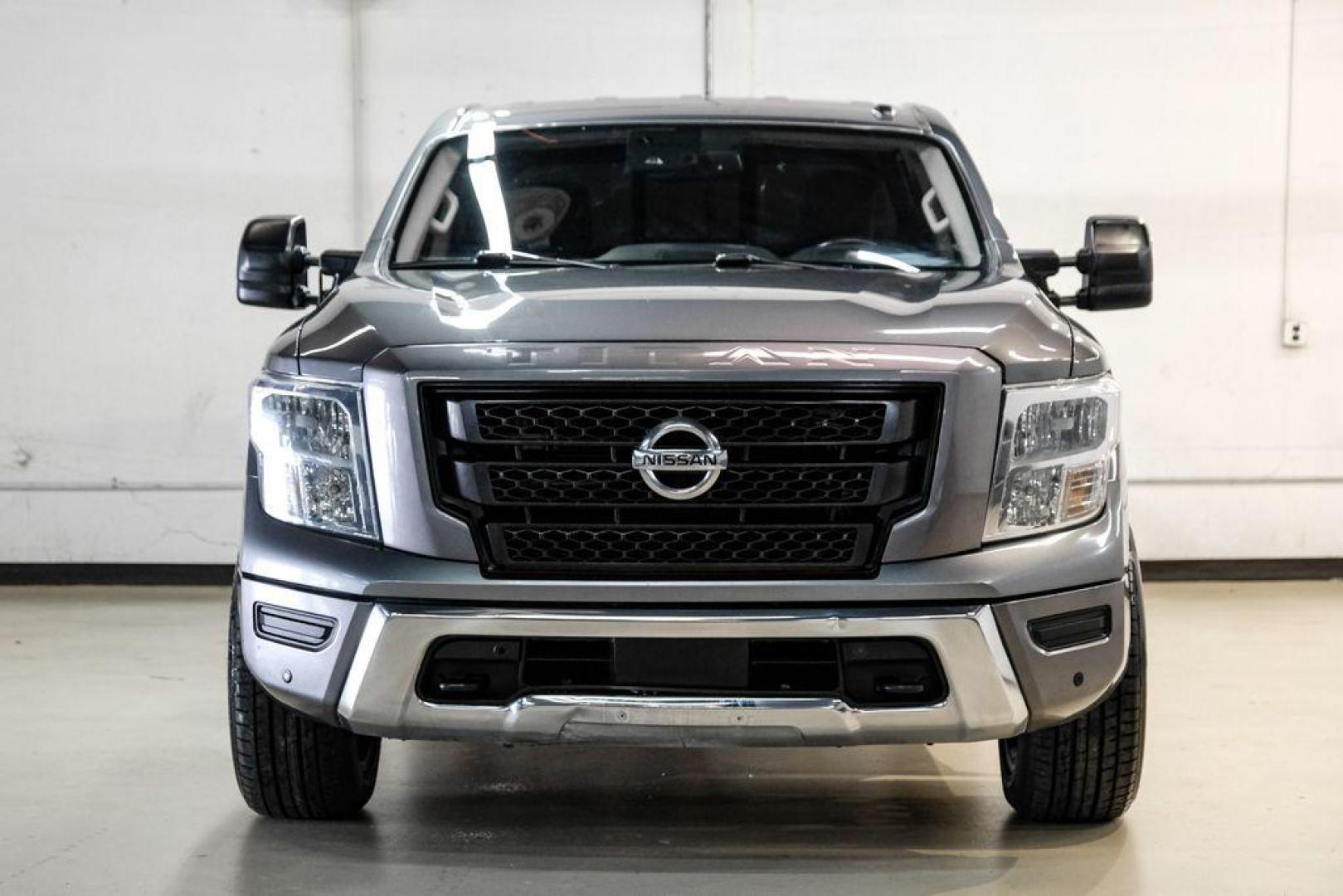 2021 Gun Metallic /Black Nissan Titan SV (1N6AA1ED4MN) with an 5.6L V8 DOHC 32V 400hp engine, Automatic transmission, located at 15300 Midway Rd., Addison, TX, 75001, (972) 702-0011, 32.958321, -96.838074 - Photo#4