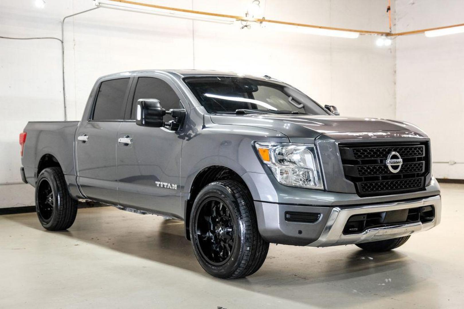 2021 Gun Metallic /Black Nissan Titan SV (1N6AA1ED4MN) with an 5.6L V8 DOHC 32V 400hp engine, Automatic transmission, located at 15300 Midway Rd., Addison, TX, 75001, (972) 702-0011, 32.958321, -96.838074 - Photo#5