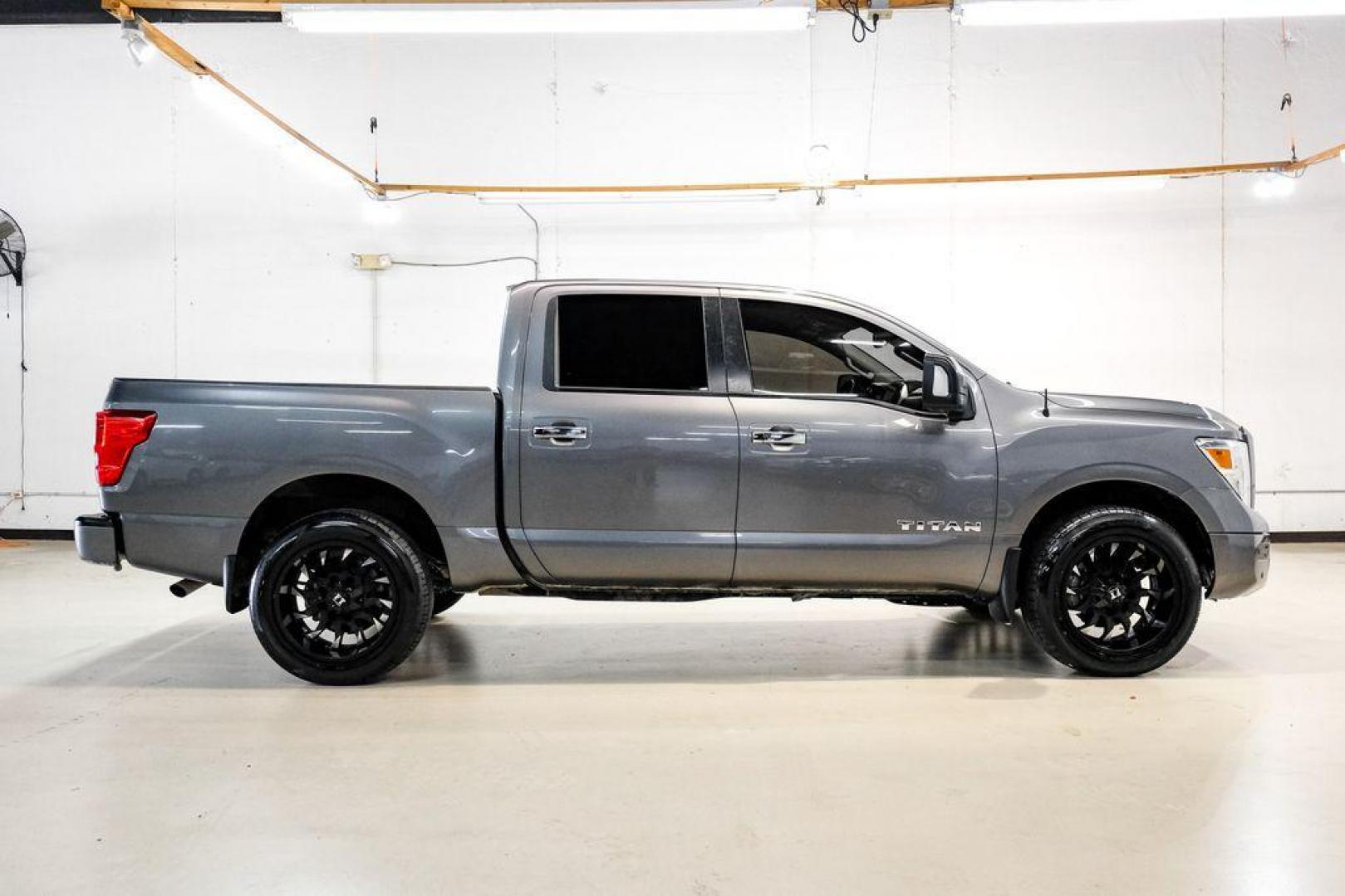 2021 Gun Metallic /Black Nissan Titan SV (1N6AA1ED4MN) with an 5.6L V8 DOHC 32V 400hp engine, Automatic transmission, located at 15300 Midway Rd., Addison, TX, 75001, (972) 702-0011, 32.958321, -96.838074 - Photo#6