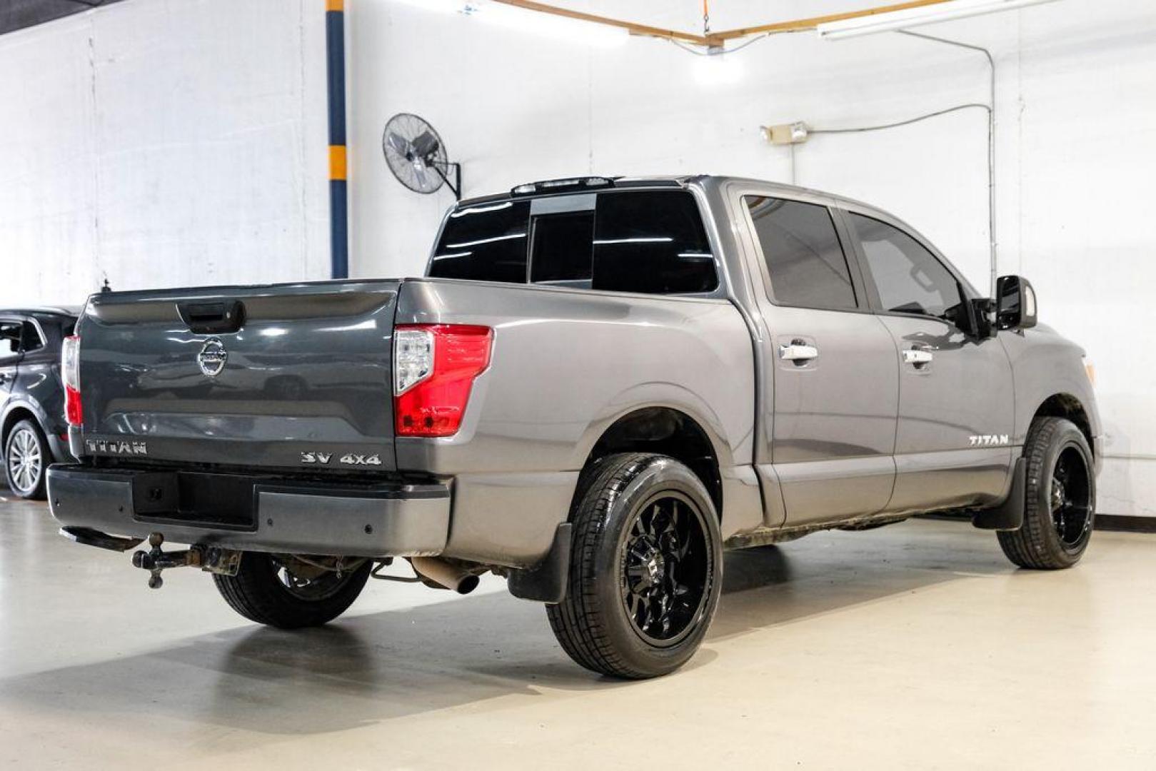 2021 Gun Metallic /Black Nissan Titan SV (1N6AA1ED4MN) with an 5.6L V8 DOHC 32V 400hp engine, Automatic transmission, located at 15300 Midway Rd., Addison, TX, 75001, (972) 702-0011, 32.958321, -96.838074 - Photo#7