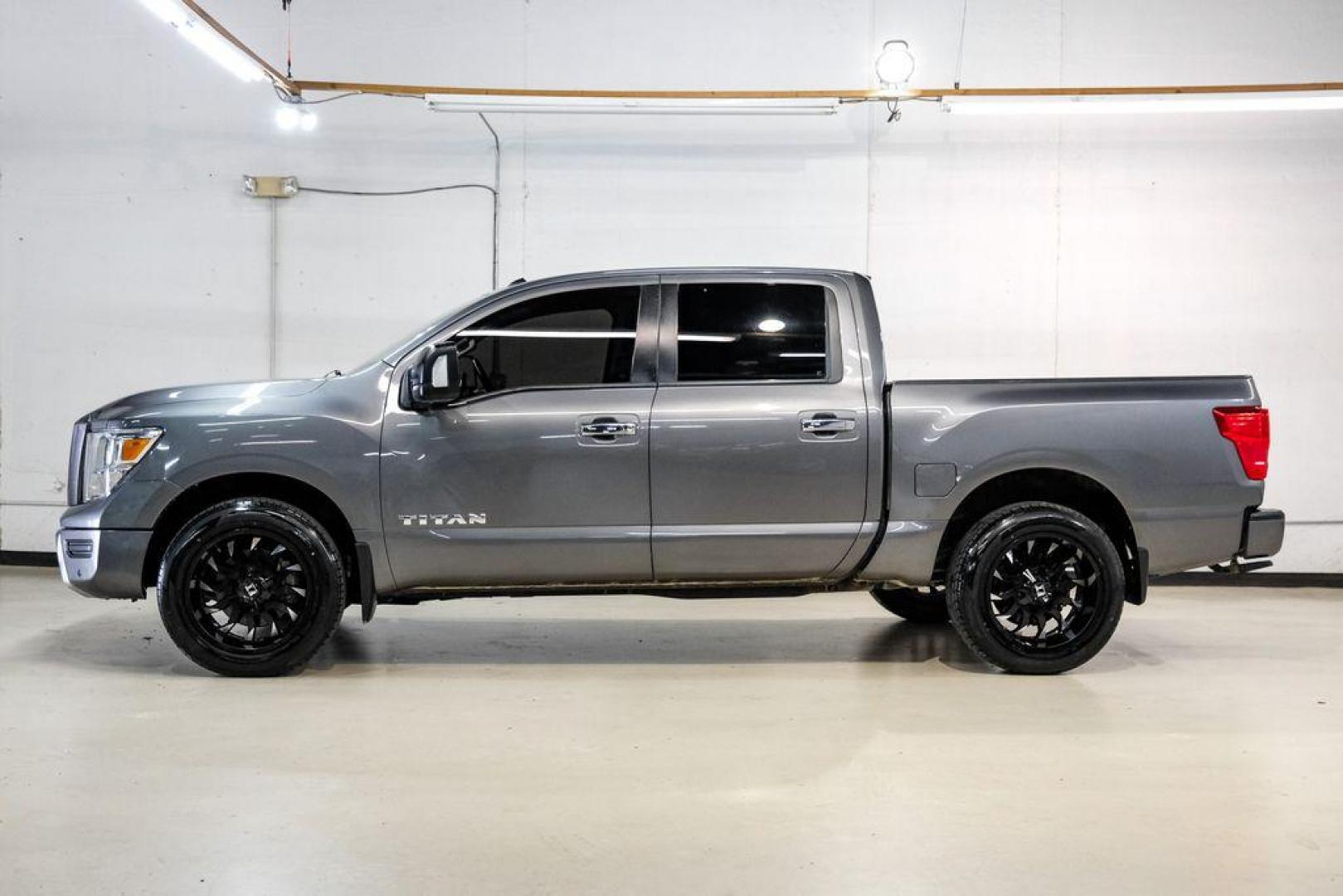 2021 Gun Metallic /Black Nissan Titan SV (1N6AA1ED4MN) with an 5.6L V8 DOHC 32V 400hp engine, Automatic transmission, located at 15300 Midway Rd., Addison, TX, 75001, (972) 702-0011, 32.958321, -96.838074 - Photo#10