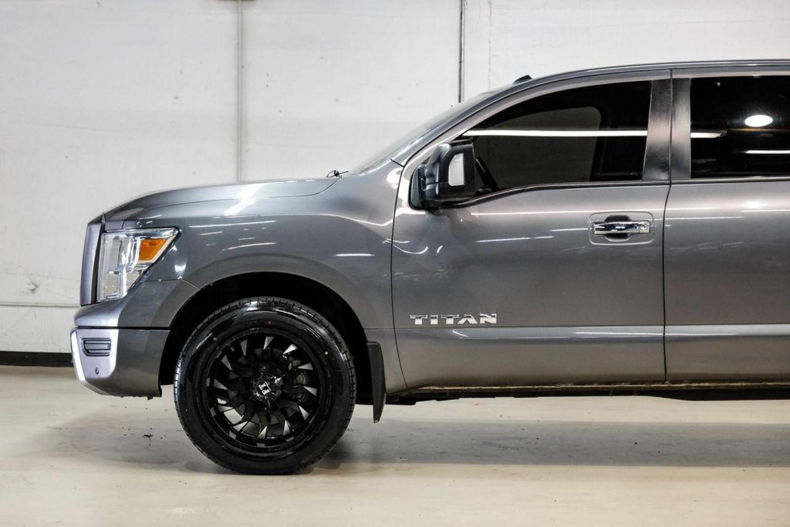 2021 Gun Metallic /Black Nissan Titan SV (1N6AA1ED4MN) with an 5.6L V8 DOHC 32V 400hp engine, Automatic transmission, located at 15300 Midway Rd., Addison, TX, 75001, (972) 702-0011, 32.958321, -96.838074 - Photo#11