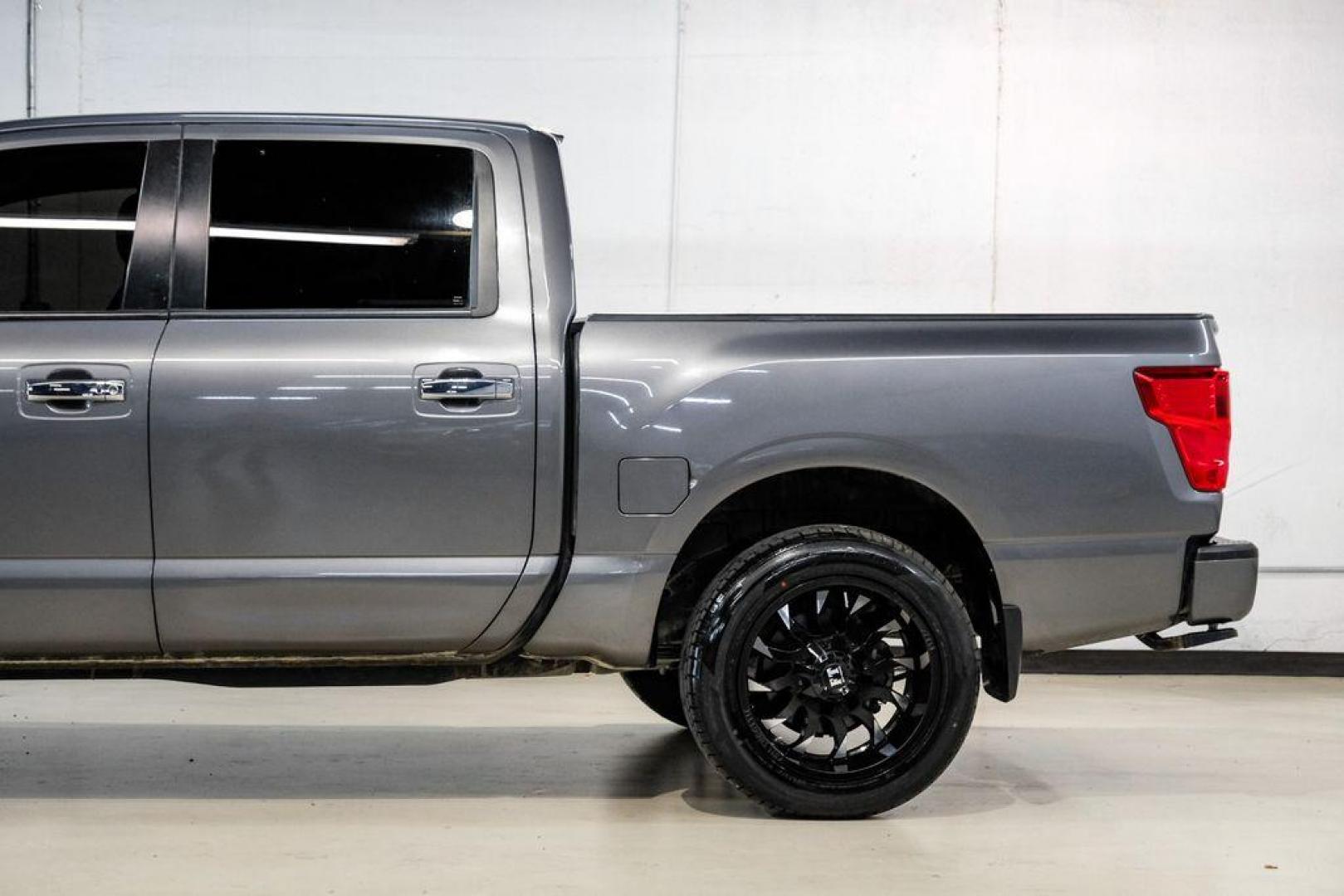 2021 Gun Metallic /Black Nissan Titan SV (1N6AA1ED4MN) with an 5.6L V8 DOHC 32V 400hp engine, Automatic transmission, located at 15300 Midway Rd., Addison, TX, 75001, (972) 702-0011, 32.958321, -96.838074 - Photo#12