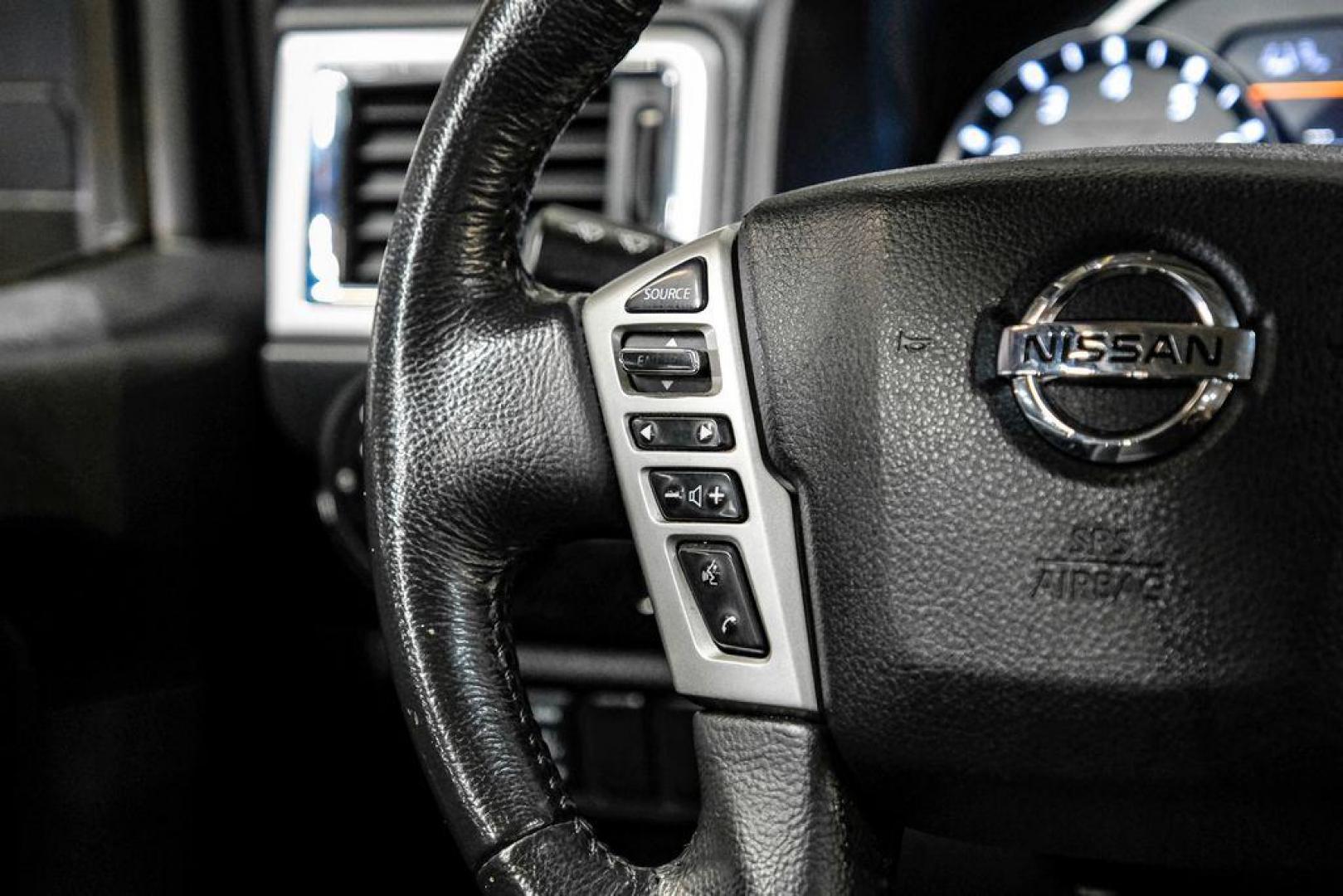 2021 Gun Metallic /Black Nissan Titan SV (1N6AA1ED4MN) with an 5.6L V8 DOHC 32V 400hp engine, Automatic transmission, located at 15300 Midway Rd., Addison, TX, 75001, (972) 702-0011, 32.958321, -96.838074 - Photo#16