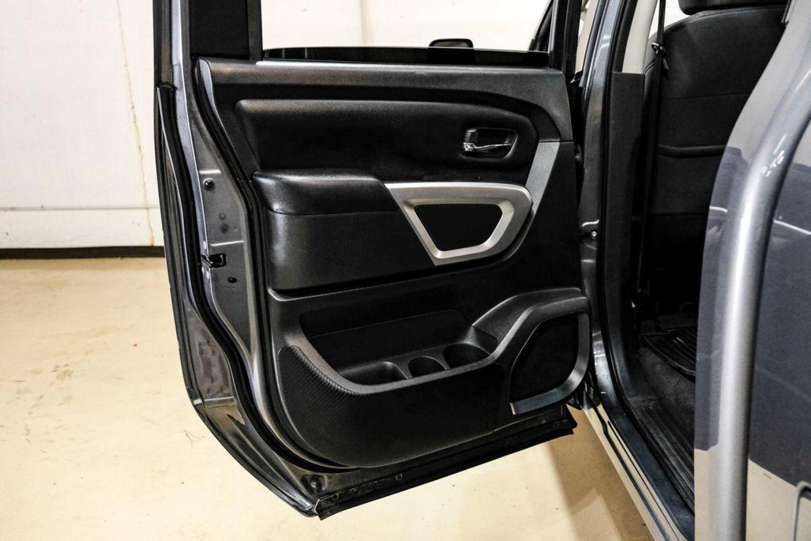 2021 Gun Metallic /Black Nissan Titan SV (1N6AA1ED4MN) with an 5.6L V8 DOHC 32V 400hp engine, Automatic transmission, located at 15300 Midway Rd., Addison, TX, 75001, (972) 702-0011, 32.958321, -96.838074 - Photo#39