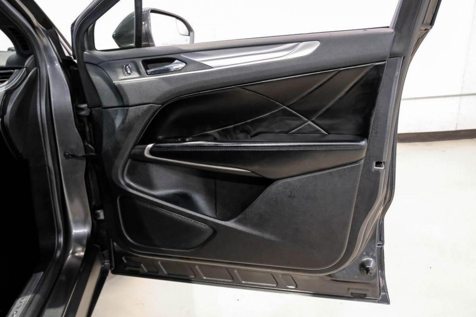 2019 Magnetic Gray Metallic /Ebony Lincoln MKC Standard (5LMCJ1C91KU) with an 2.0L I4 engine, Automatic transmission, located at 15300 Midway Rd., Addison, TX, 75001, (972) 702-0011, 32.958321, -96.838074 - Photo#46