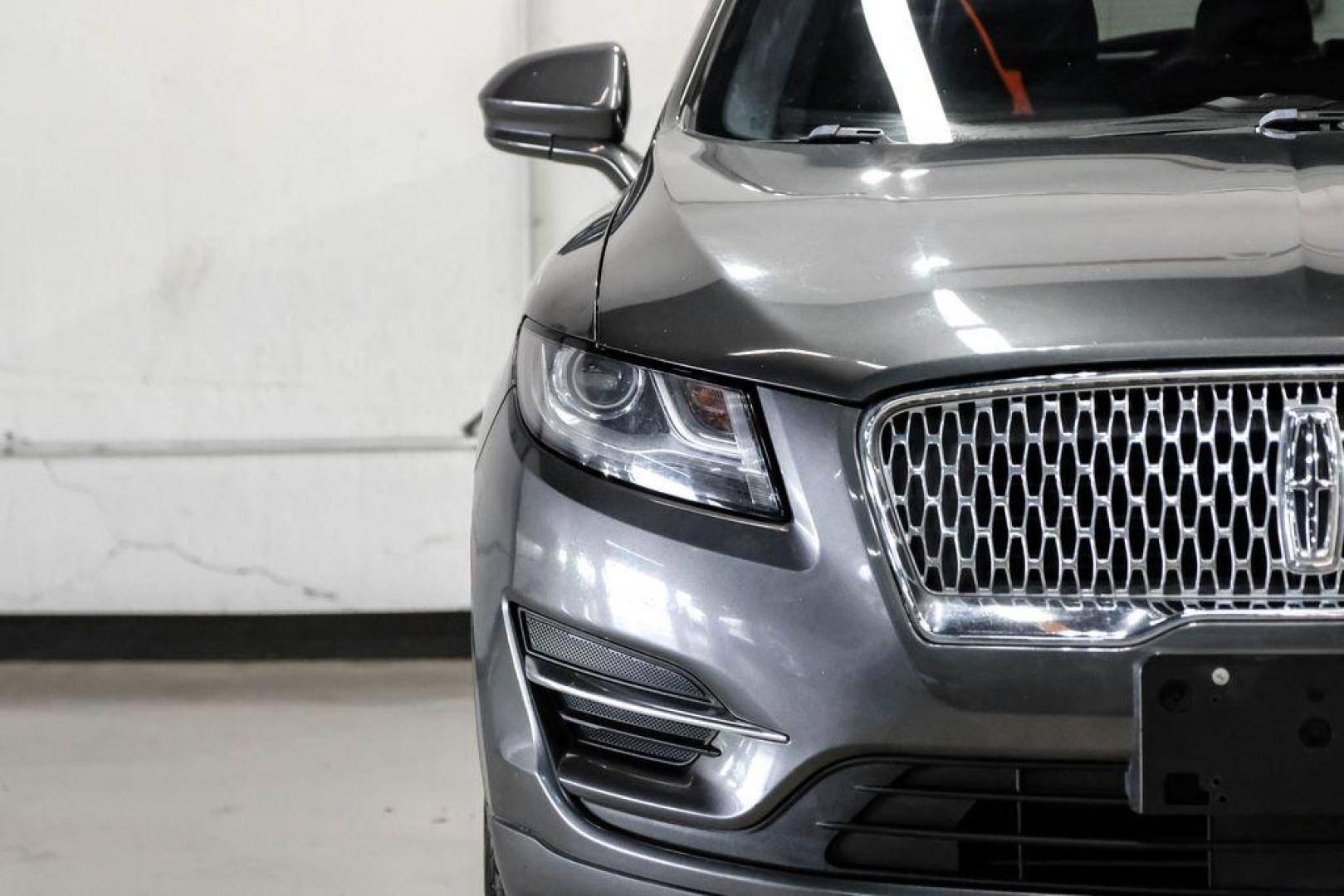 2019 Magnetic Gray Metallic /Ebony Lincoln MKC Standard (5LMCJ1C91KU) with an 2.0L I4 engine, Automatic transmission, located at 15300 Midway Rd., Addison, TX, 75001, (972) 702-0011, 32.958321, -96.838074 - Photo#49