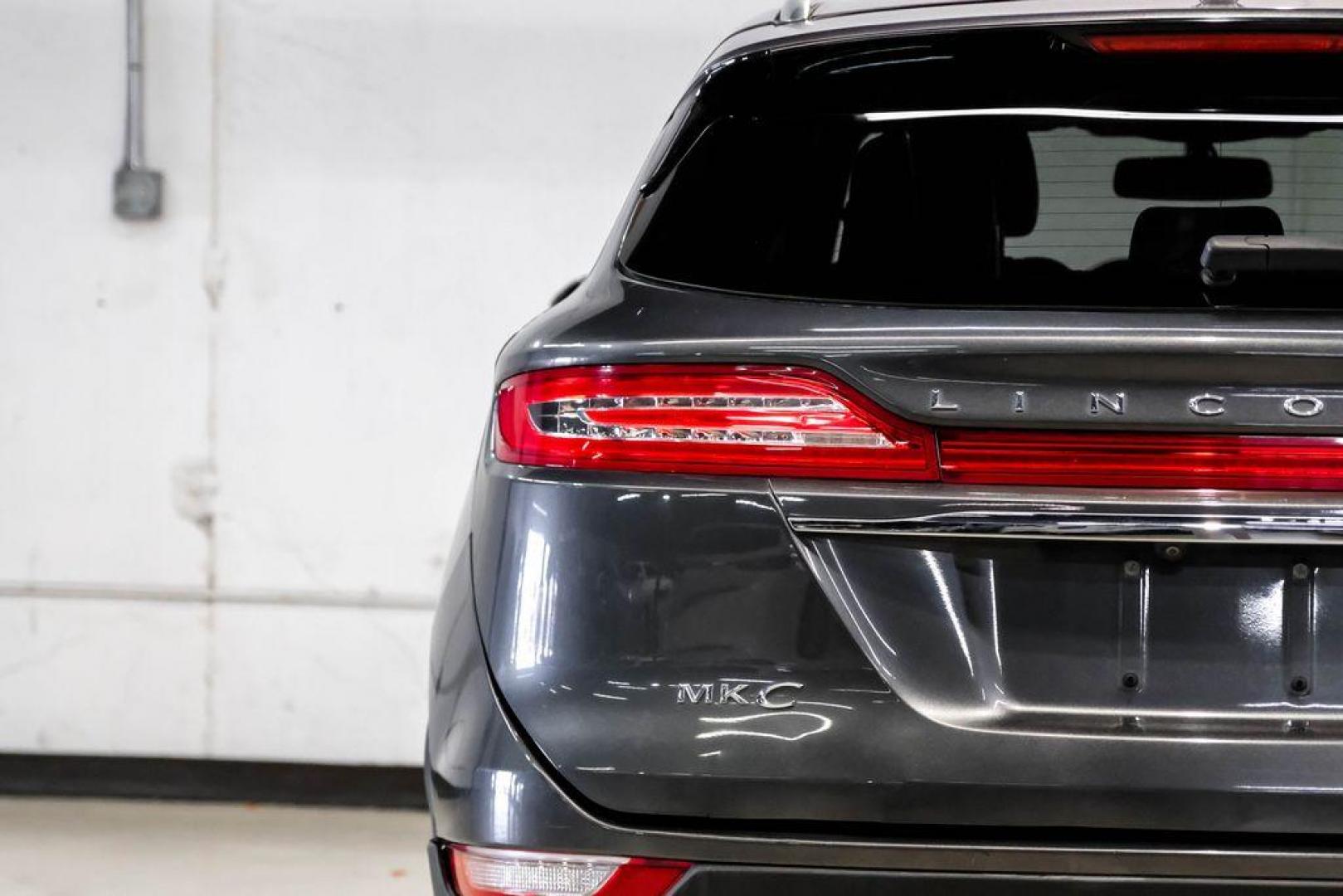 2019 Magnetic Gray Metallic /Ebony Lincoln MKC Standard (5LMCJ1C91KU) with an 2.0L I4 engine, Automatic transmission, located at 15300 Midway Rd., Addison, TX, 75001, (972) 702-0011, 32.958321, -96.838074 - Photo#51