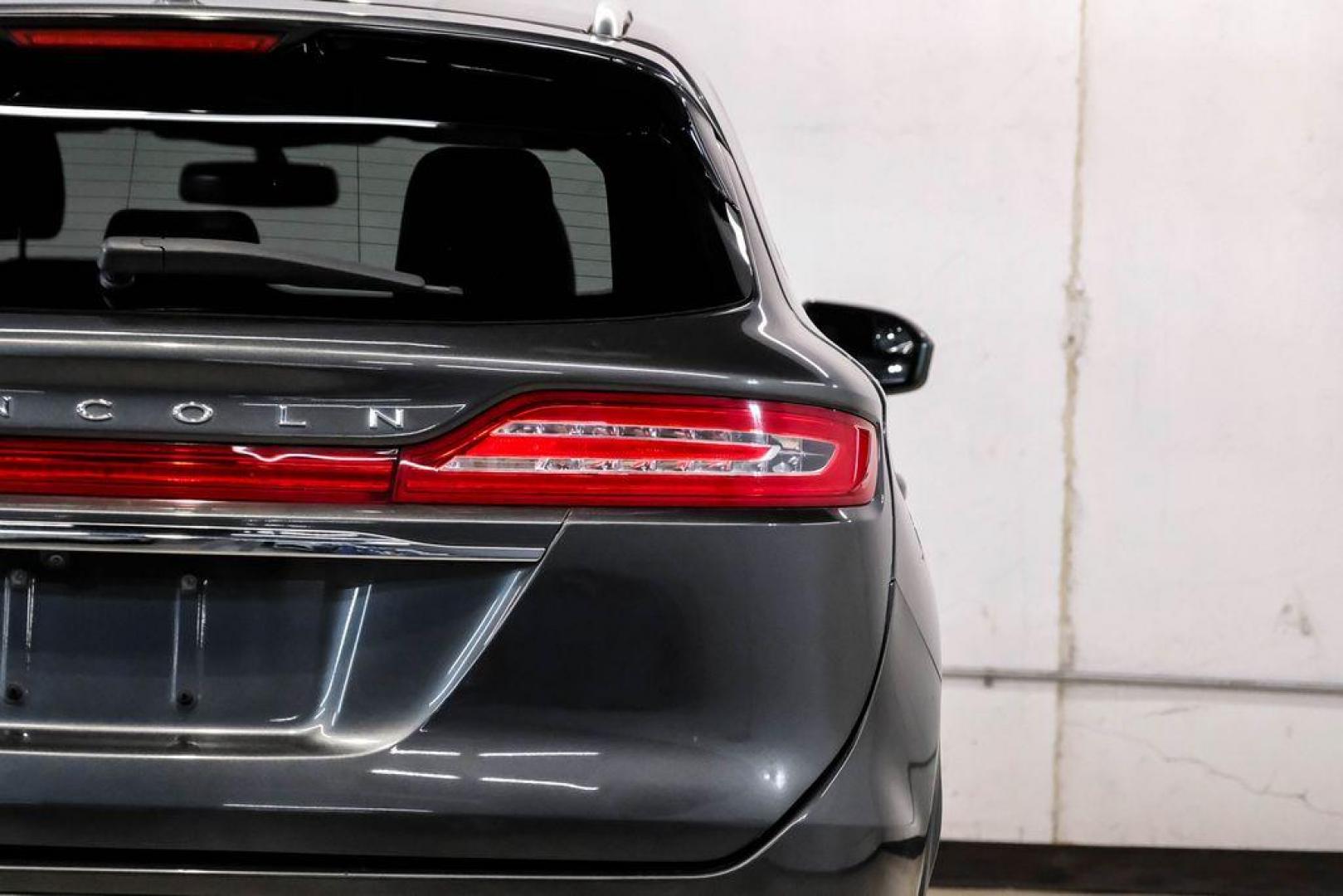 2019 Magnetic Gray Metallic /Ebony Lincoln MKC Standard (5LMCJ1C91KU) with an 2.0L I4 engine, Automatic transmission, located at 15300 Midway Rd., Addison, TX, 75001, (972) 702-0011, 32.958321, -96.838074 - Photo#52