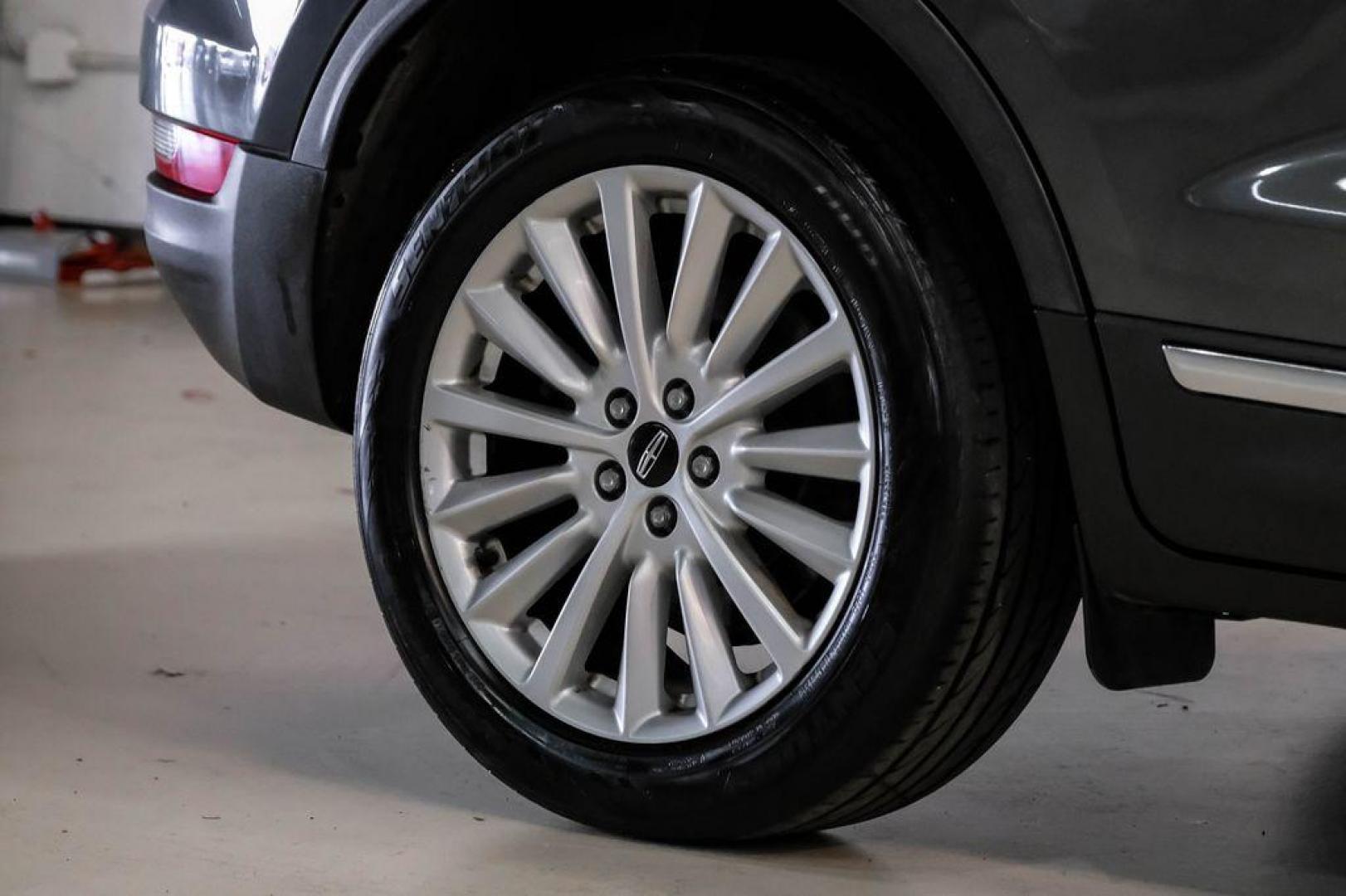 2019 Magnetic Gray Metallic /Ebony Lincoln MKC Standard (5LMCJ1C91KU) with an 2.0L I4 engine, Automatic transmission, located at 15300 Midway Rd., Addison, TX, 75001, (972) 702-0011, 32.958321, -96.838074 - Photo#58
