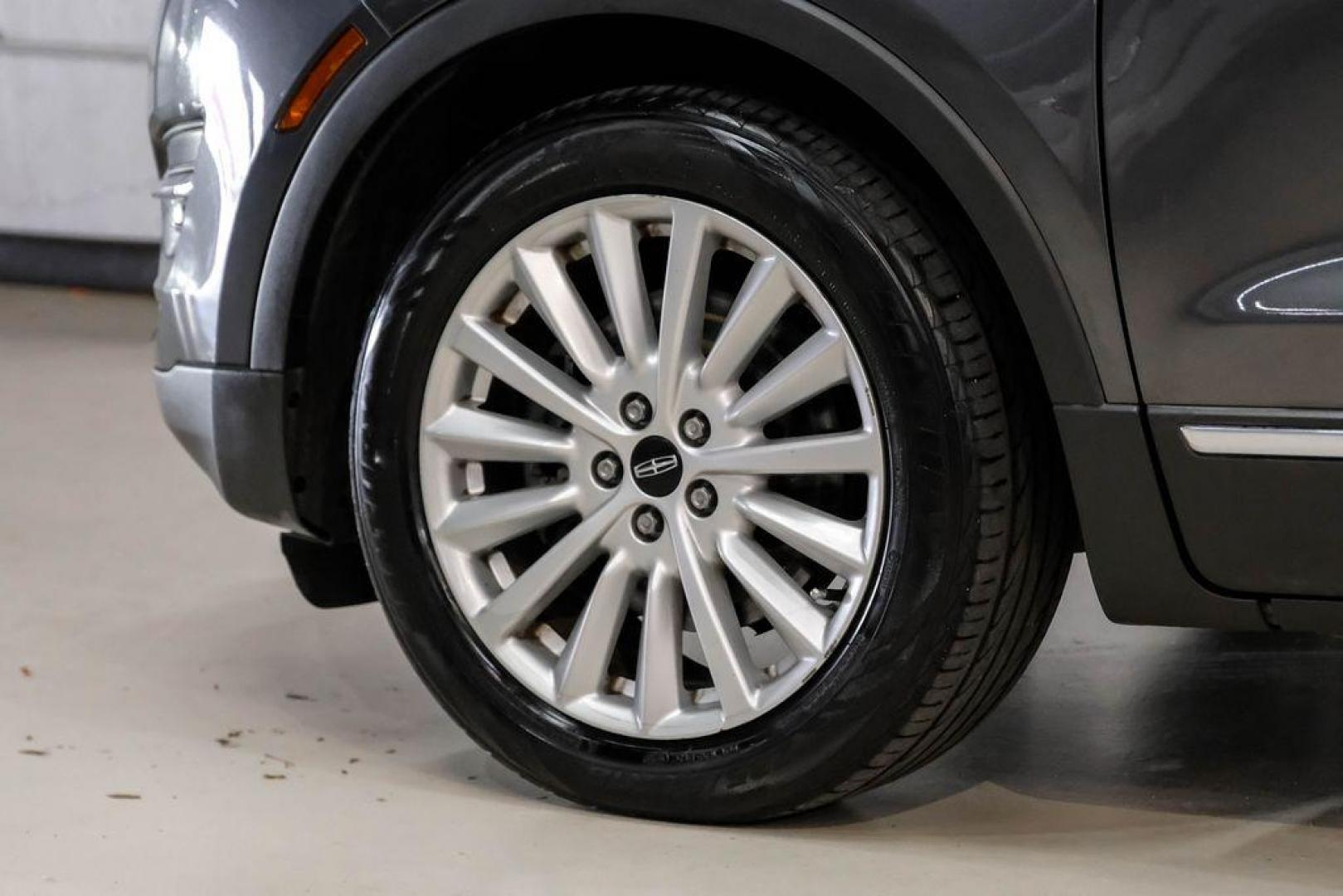 2019 Magnetic Gray Metallic /Ebony Lincoln MKC Standard (5LMCJ1C91KU) with an 2.0L I4 engine, Automatic transmission, located at 15300 Midway Rd., Addison, TX, 75001, (972) 702-0011, 32.958321, -96.838074 - Photo#60