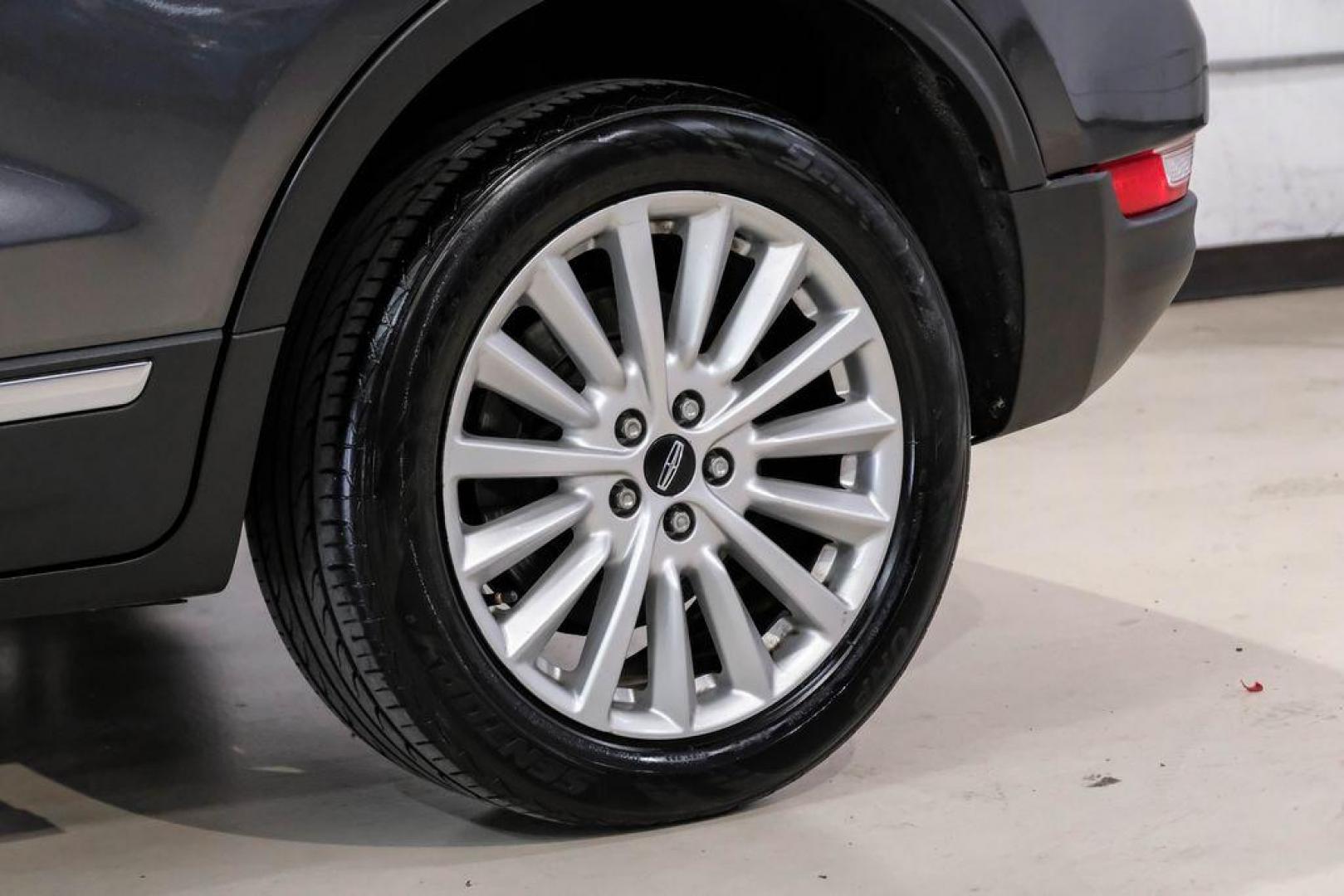 2019 Magnetic Gray Metallic /Ebony Lincoln MKC Standard (5LMCJ1C91KU) with an 2.0L I4 engine, Automatic transmission, located at 15300 Midway Rd., Addison, TX, 75001, (972) 702-0011, 32.958321, -96.838074 - Photo#61