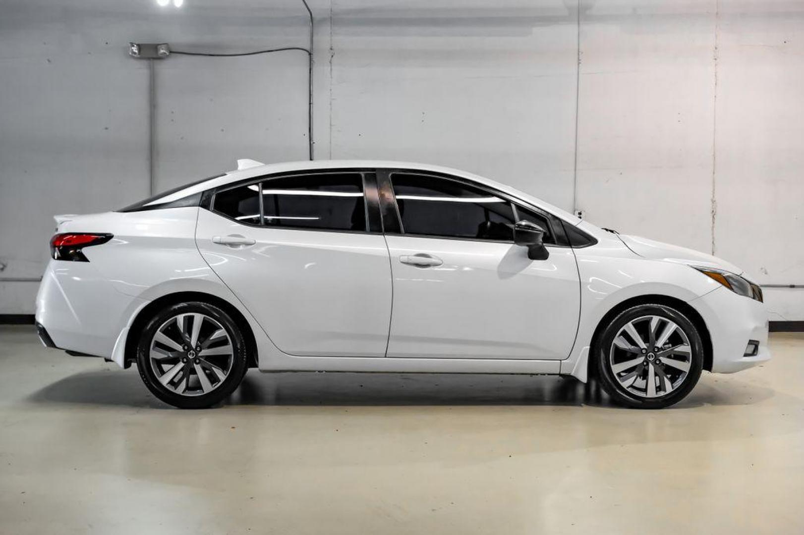 2020 Aspen White /Sport Interior Nissan Versa 1.6 SR (3N1CN8FV3LL) with an 1.6L 4-Cylinder DOHC 16V engine, CVT transmission, located at 15300 Midway Rd., Addison, TX, 75001, (972) 702-0011, 32.958321, -96.838074 - Photo#6
