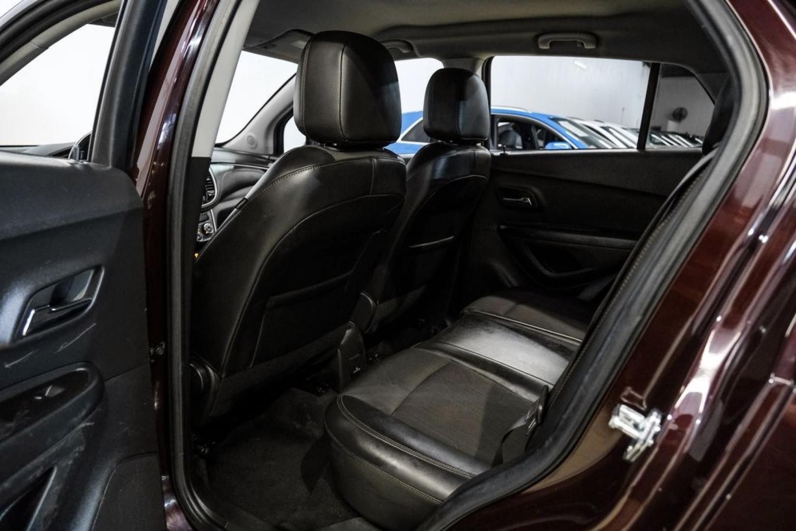 2022 Black Cherry Metallic /Jet Black Chevrolet Trax LT (KL7CJPSM4NB) with an Turbo 1.4L VVT DOHC 4-Cylinder DI SIDI engine, Automatic transmission, located at 15300 Midway Rd., Addison, TX, 75001, (972) 702-0011, 32.958321, -96.838074 - Photo#38