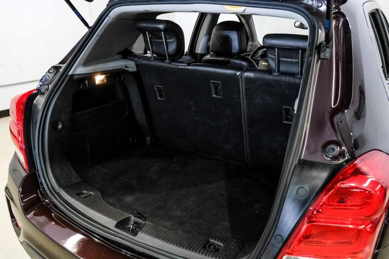 2022 Black Cherry Metallic /Jet Black Chevrolet Trax LT (KL7CJPSM4NB) with an Turbo 1.4L VVT DOHC 4-Cylinder DI SIDI engine, Automatic transmission, located at 15300 Midway Rd., Addison, TX, 75001, (972) 702-0011, 32.958321, -96.838074 - Photo#53