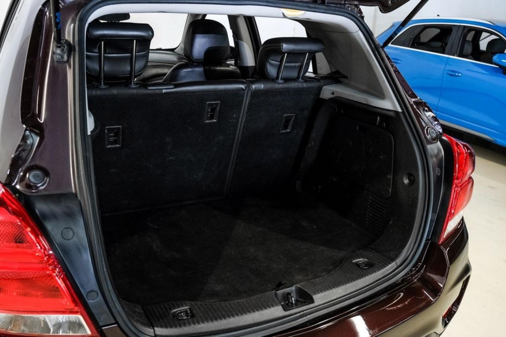 2022 Black Cherry Metallic /Jet Black Chevrolet Trax LT (KL7CJPSM4NB) with an Turbo 1.4L VVT DOHC 4-Cylinder DI SIDI engine, Automatic transmission, located at 15300 Midway Rd., Addison, TX, 75001, (972) 702-0011, 32.958321, -96.838074 - Photo#54