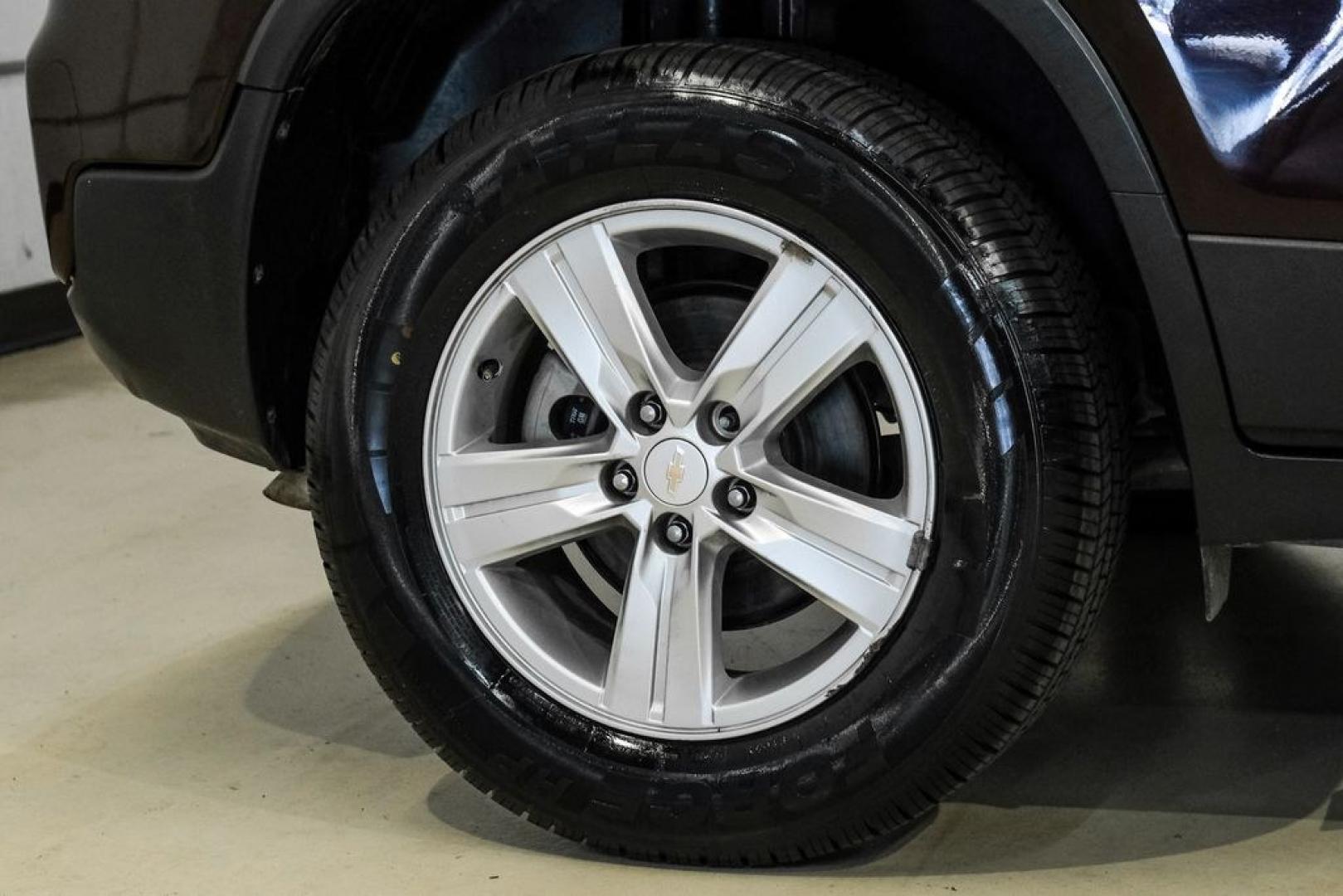 2022 Black Cherry Metallic /Jet Black Chevrolet Trax LT (KL7CJPSM4NB) with an Turbo 1.4L VVT DOHC 4-Cylinder DI SIDI engine, Automatic transmission, located at 15300 Midway Rd., Addison, TX, 75001, (972) 702-0011, 32.958321, -96.838074 - Photo#57