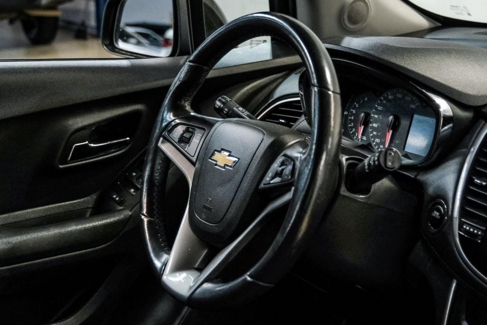 2022 Black Cherry Metallic /Jet Black Chevrolet Trax LT (KL7CJPSM4NB) with an Turbo 1.4L VVT DOHC 4-Cylinder DI SIDI engine, Automatic transmission, located at 15300 Midway Rd., Addison, TX, 75001, (972) 702-0011, 32.958321, -96.838074- Photo#13