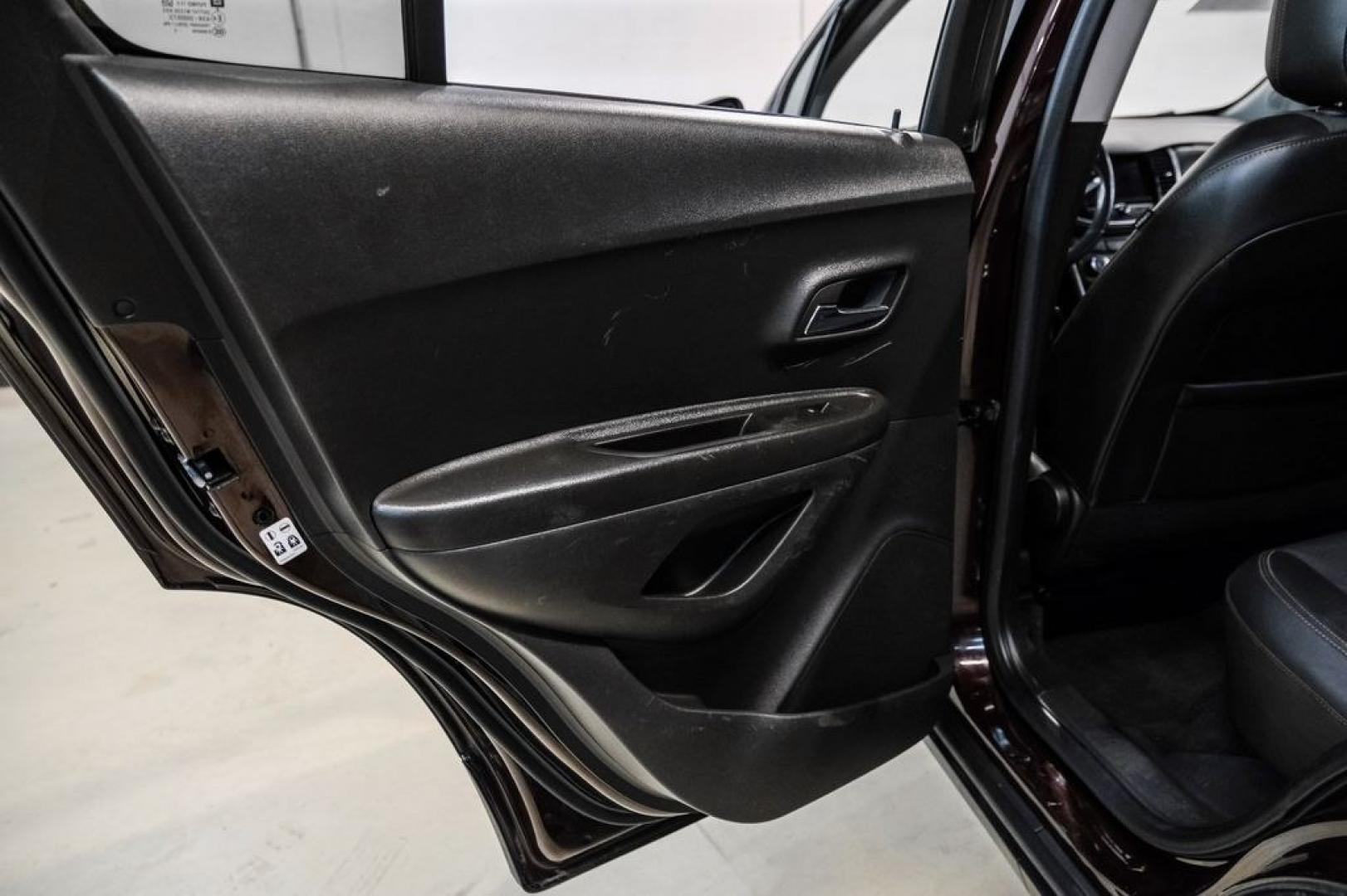 2022 Black Cherry Metallic /Jet Black Chevrolet Trax LT (KL7CJPSM4NB) with an Turbo 1.4L VVT DOHC 4-Cylinder DI SIDI engine, Automatic transmission, located at 15300 Midway Rd., Addison, TX, 75001, (972) 702-0011, 32.958321, -96.838074- Photo#37