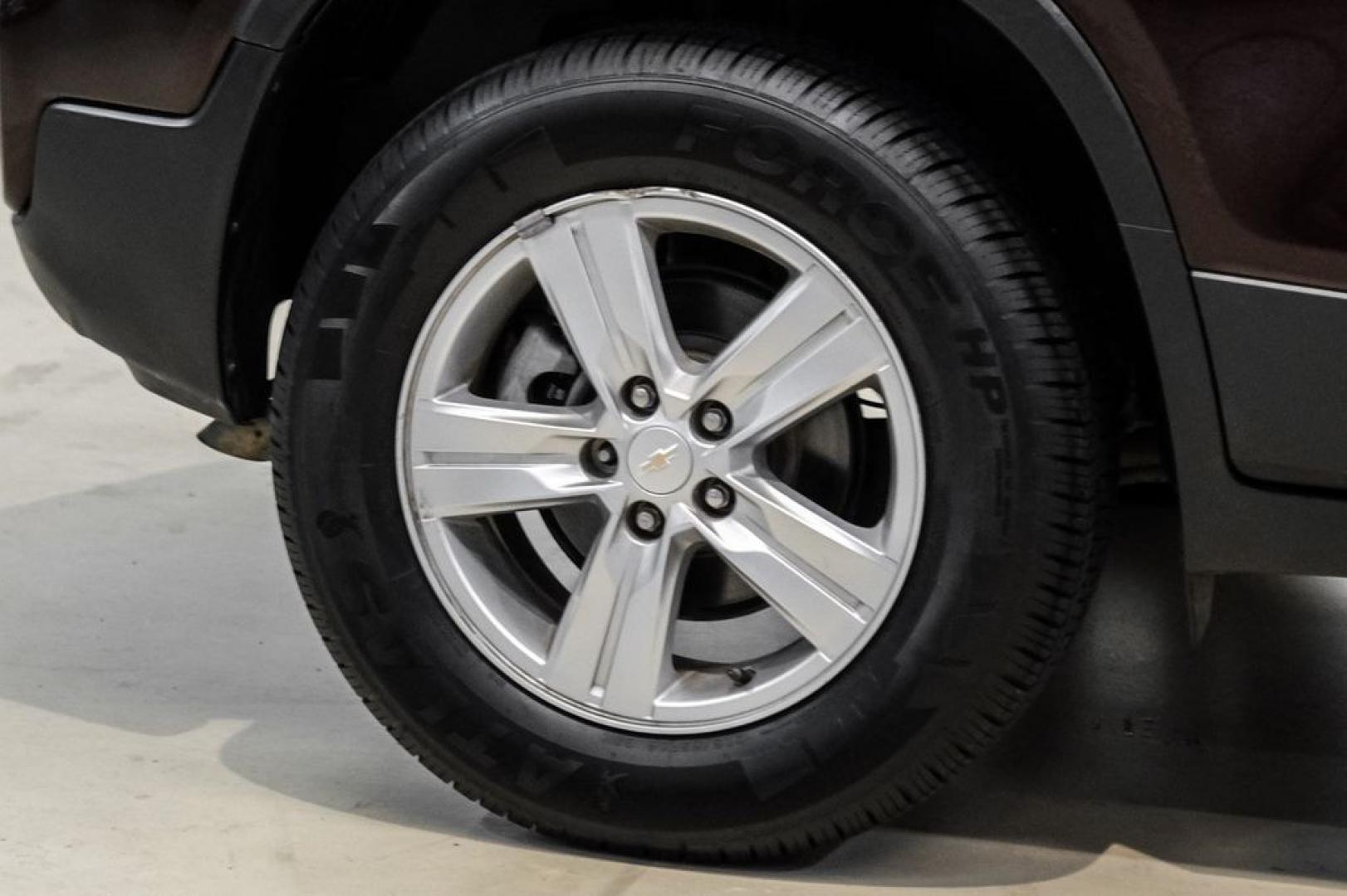 2022 Black Cherry Metallic /Jet Black Chevrolet Trax LT (KL7CJPSM4NB) with an Turbo 1.4L VVT DOHC 4-Cylinder DI SIDI engine, Automatic transmission, located at 15300 Midway Rd., Addison, TX, 75001, (972) 702-0011, 32.958321, -96.838074- Photo#48