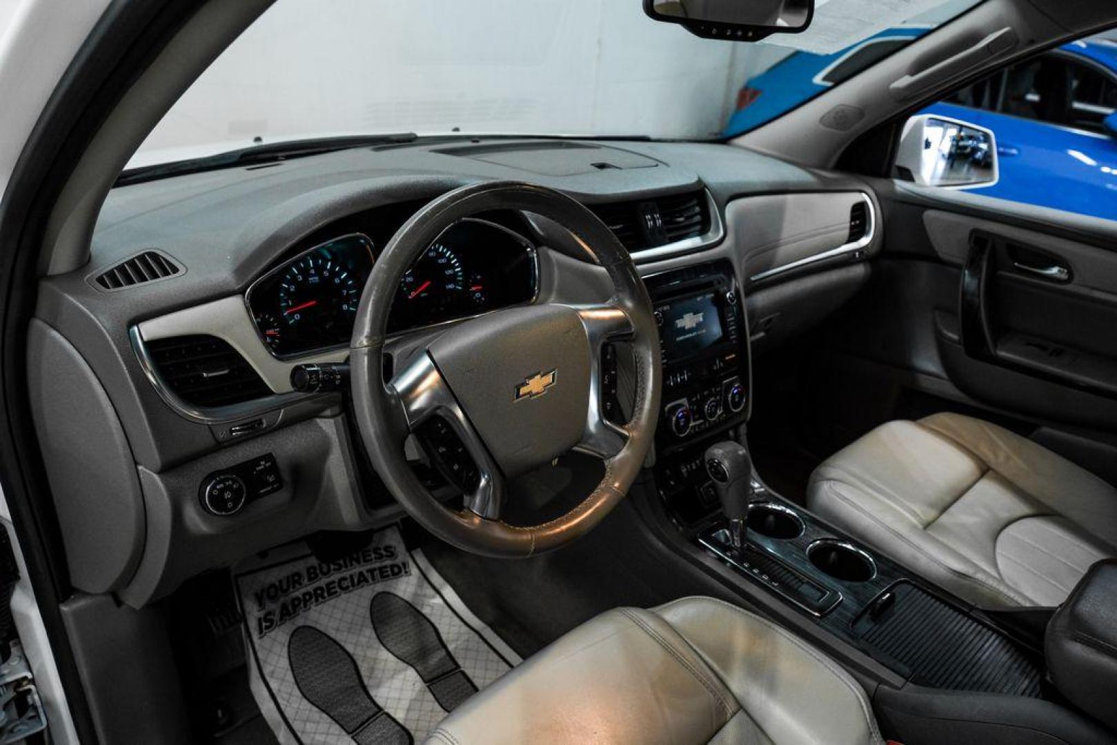 2017 Summit White /Dark Titanium/Light Titanium Chevrolet Traverse Premier (1GNKRJKD3HJ) with an 3.6L V6 SIDI engine, Automatic transmission, located at 15300 Midway Rd., Addison, TX, 75001, (972) 702-0011, 32.958321, -96.838074 - Photo#2