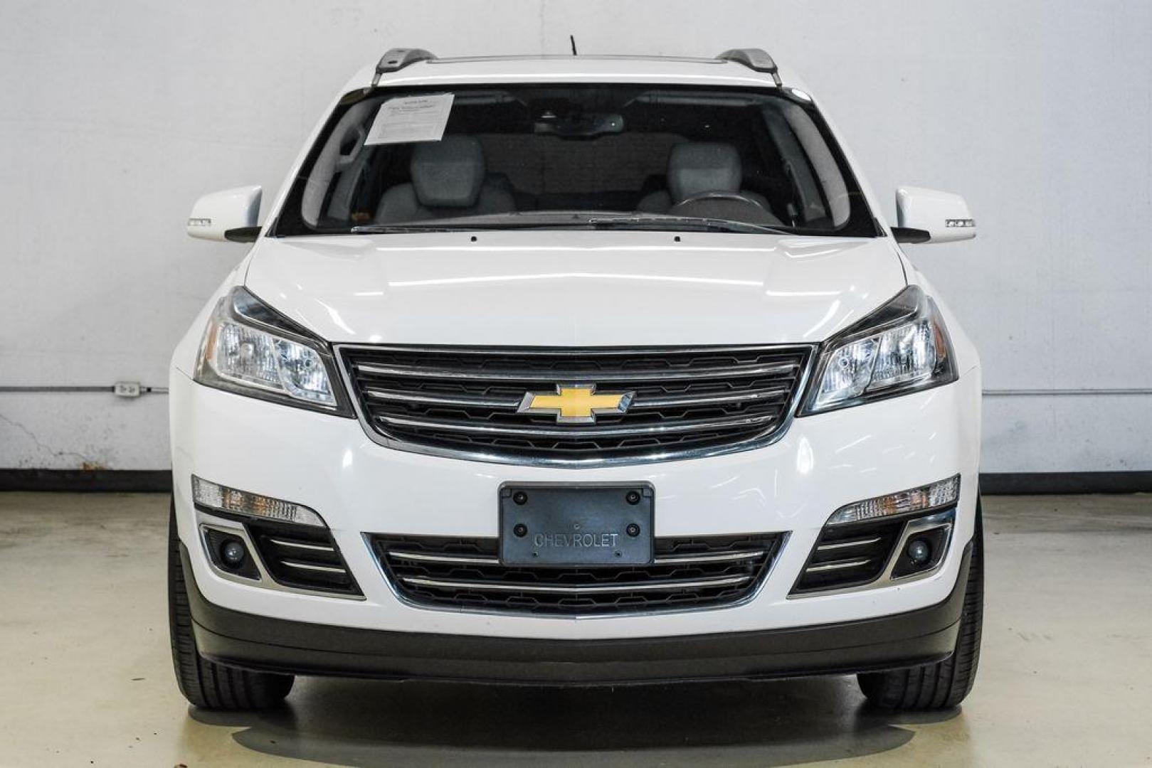 2017 Summit White /Dark Titanium/Light Titanium Chevrolet Traverse Premier (1GNKRJKD3HJ) with an 3.6L V6 SIDI engine, Automatic transmission, located at 15300 Midway Rd., Addison, TX, 75001, (972) 702-0011, 32.958321, -96.838074 - Photo#7