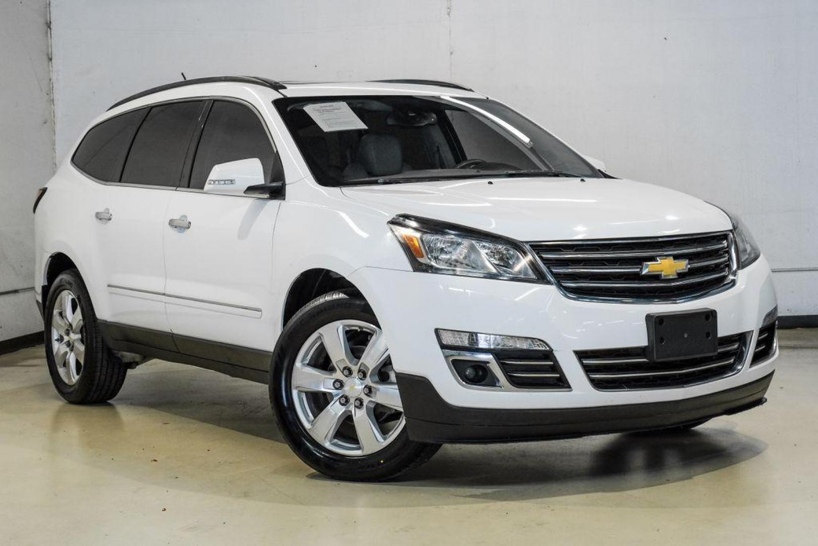2017 Summit White /Dark Titanium/Light Titanium Chevrolet Traverse Premier (1GNKRJKD3HJ) with an 3.6L V6 SIDI engine, Automatic transmission, located at 15300 Midway Rd., Addison, TX, 75001, (972) 702-0011, 32.958321, -96.838074 - Photo#8