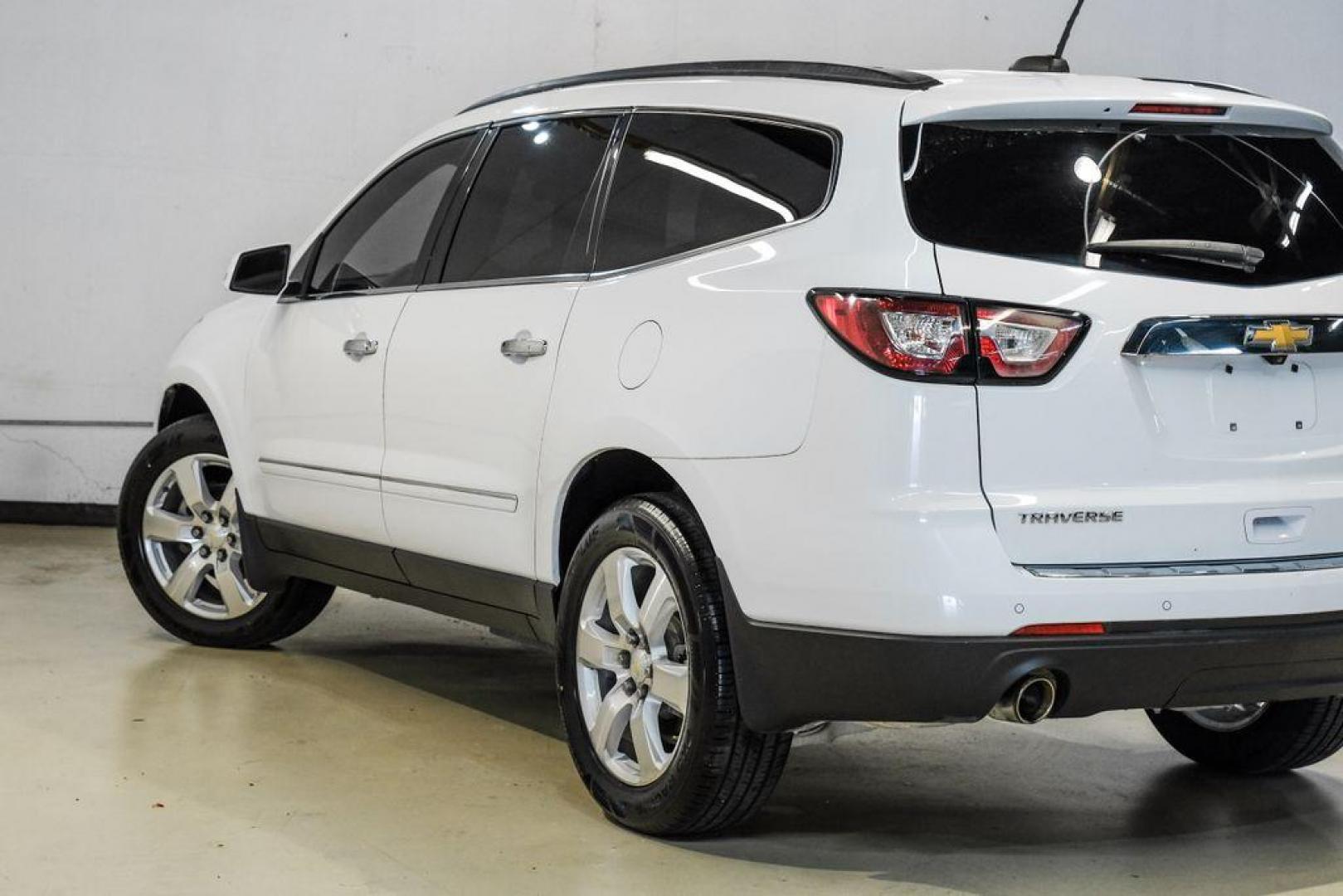 2017 Summit White /Dark Titanium/Light Titanium Chevrolet Traverse Premier (1GNKRJKD3HJ) with an 3.6L V6 SIDI engine, Automatic transmission, located at 15300 Midway Rd., Addison, TX, 75001, (972) 702-0011, 32.958321, -96.838074 - Photo#13
