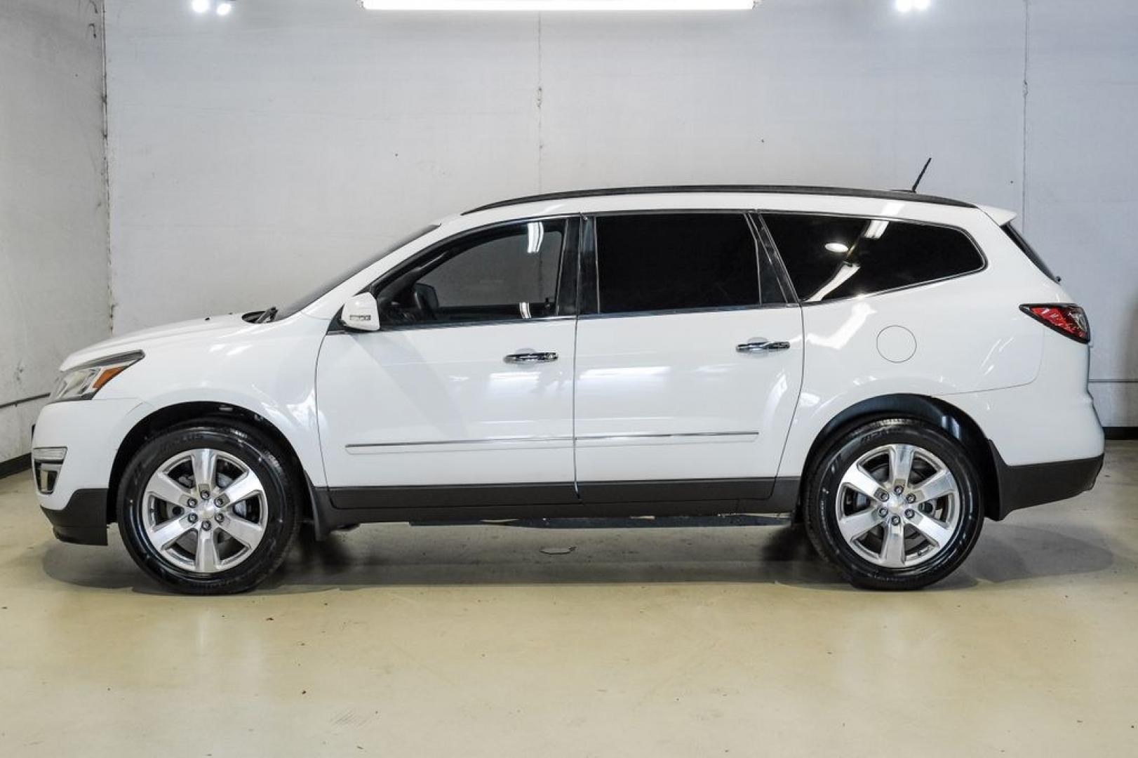 2017 Summit White /Dark Titanium/Light Titanium Chevrolet Traverse Premier (1GNKRJKD3HJ) with an 3.6L V6 SIDI engine, Automatic transmission, located at 15300 Midway Rd., Addison, TX, 75001, (972) 702-0011, 32.958321, -96.838074 - Photo#15
