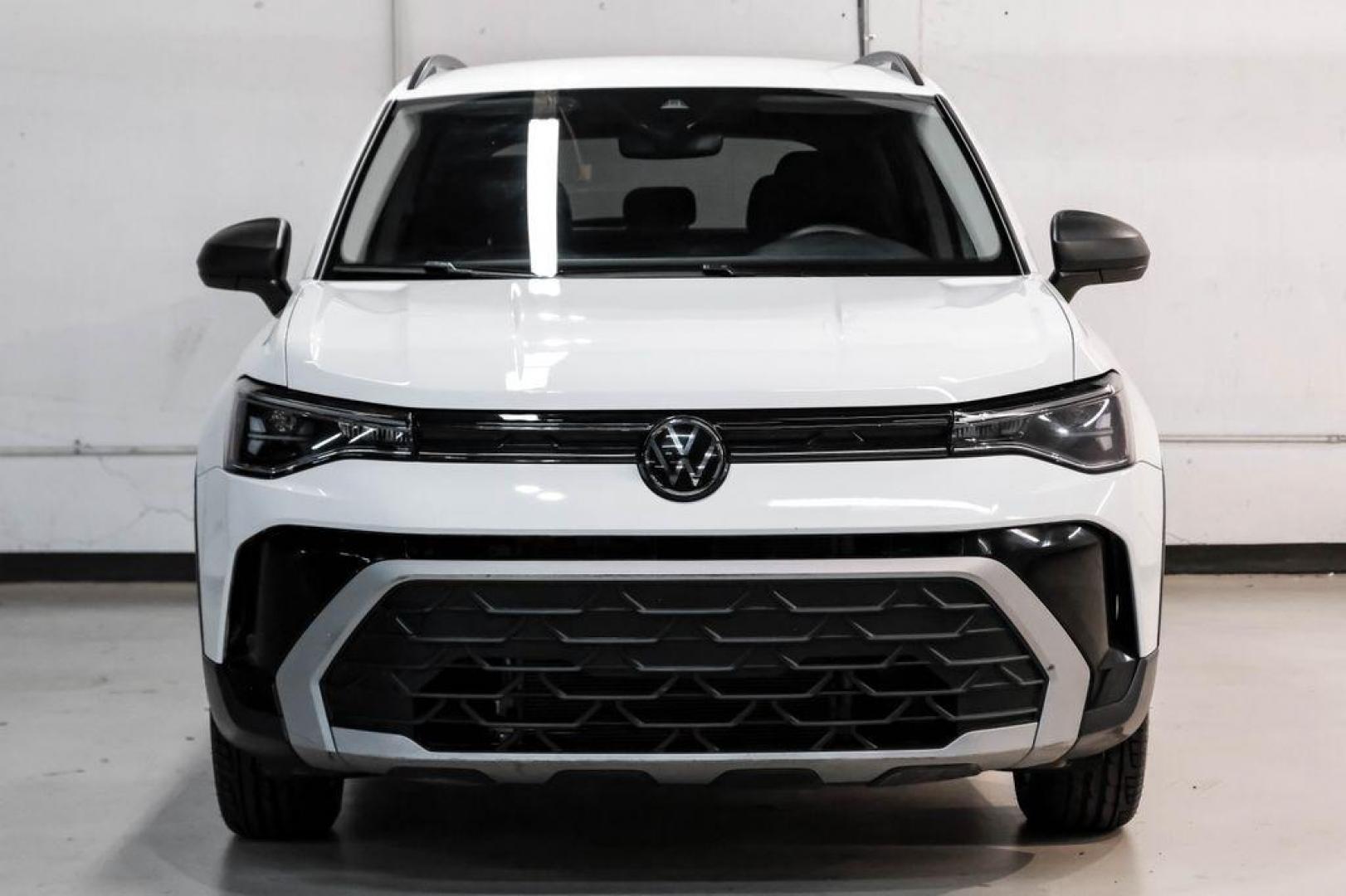 2025 Pure White /Black/White Volkswagen Taos 1.5T S (3VV5C7B2XSM) with an 1.5L I4 Turbocharged DOHC 16V LEV3-SULEV30 174hp engine, Automatic transmission, located at 15300 Midway Rd., Addison, TX, 75001, (972) 702-0011, 32.958321, -96.838074 - Photo#4