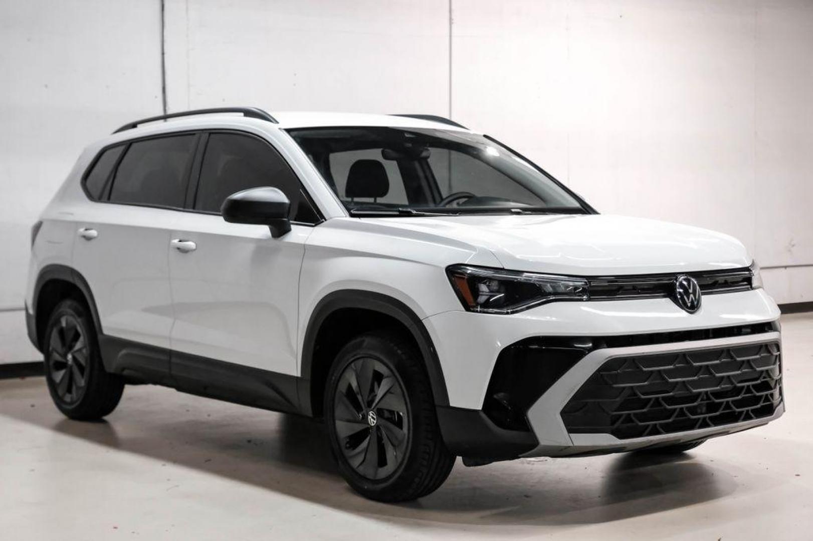 2025 Pure White /Black/White Volkswagen Taos 1.5T S (3VV5C7B2XSM) with an 1.5L I4 Turbocharged DOHC 16V LEV3-SULEV30 174hp engine, Automatic transmission, located at 15300 Midway Rd., Addison, TX, 75001, (972) 702-0011, 32.958321, -96.838074 - Photo#5
