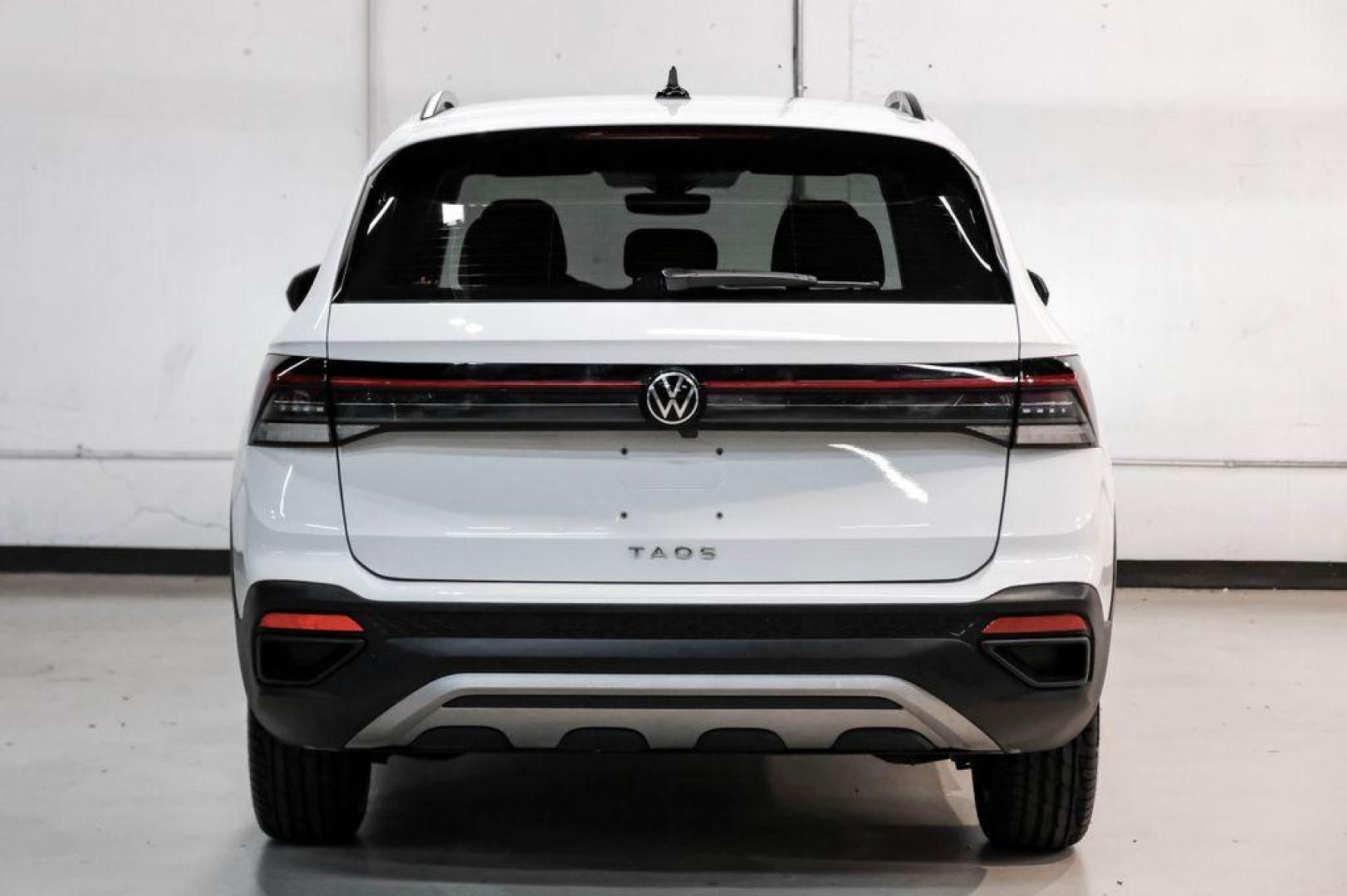 2025 Pure White /Black/White Volkswagen Taos 1.5T S (3VV5C7B2XSM) with an 1.5L I4 Turbocharged DOHC 16V LEV3-SULEV30 174hp engine, Automatic transmission, located at 15300 Midway Rd., Addison, TX, 75001, (972) 702-0011, 32.958321, -96.838074 - Photo#8