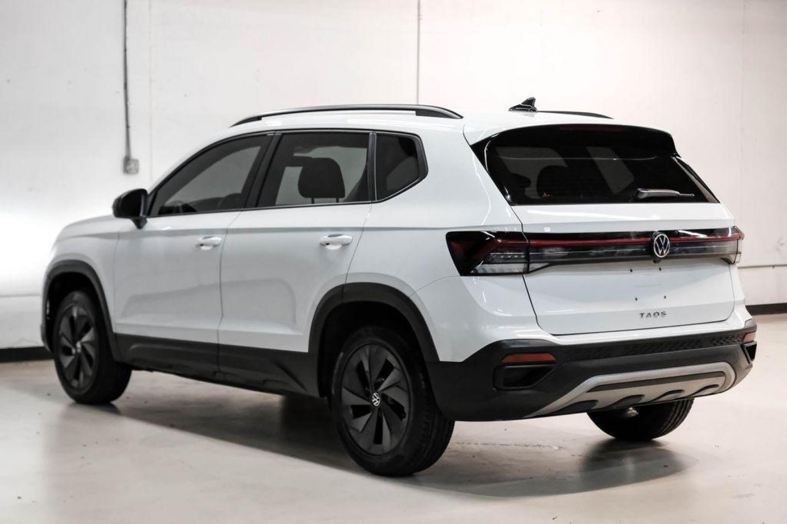 2025 Pure White /Black/White Volkswagen Taos 1.5T S (3VV5C7B2XSM) with an 1.5L I4 Turbocharged DOHC 16V LEV3-SULEV30 174hp engine, Automatic transmission, located at 15300 Midway Rd., Addison, TX, 75001, (972) 702-0011, 32.958321, -96.838074 - Photo#9