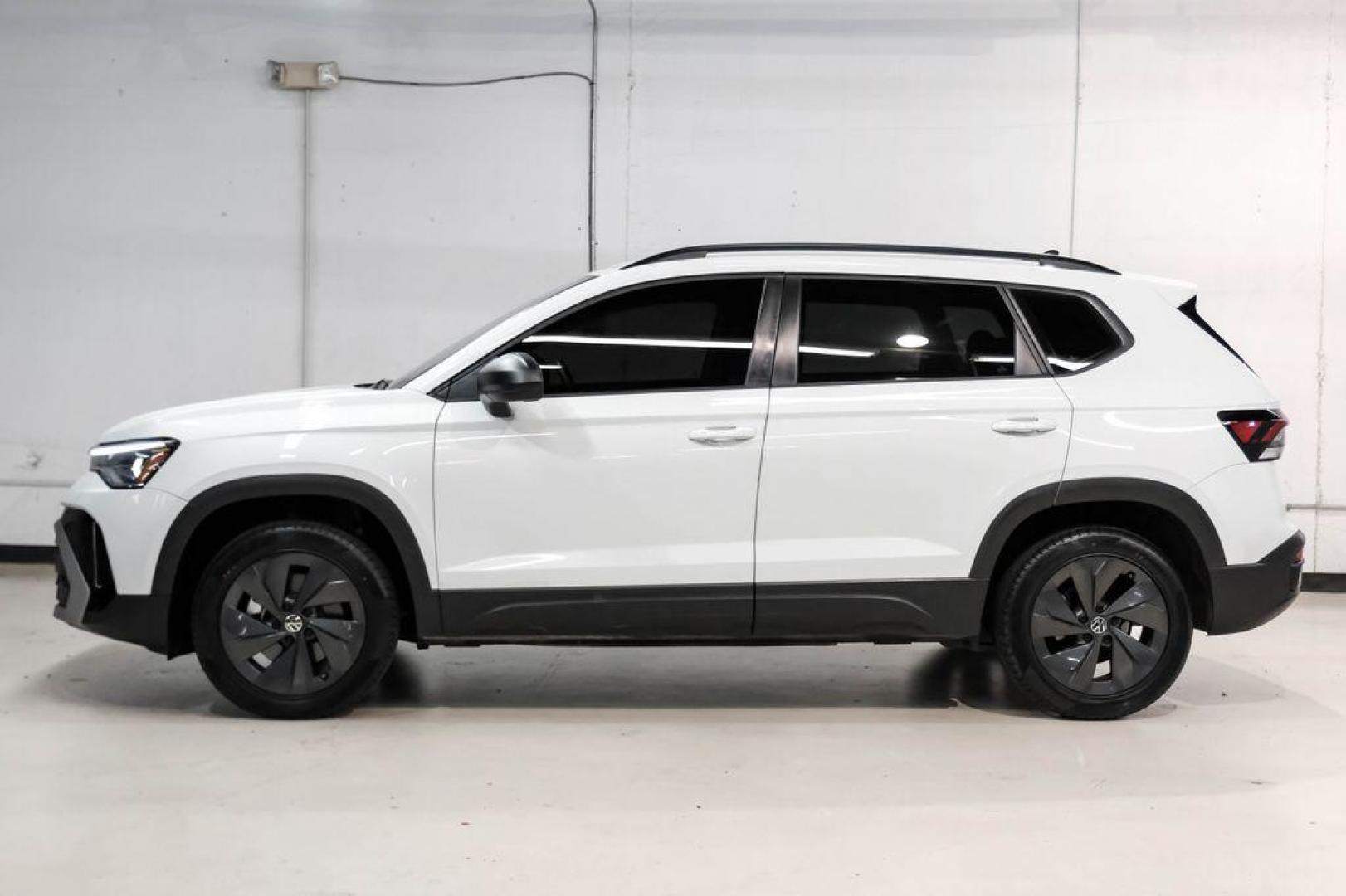 2025 Pure White /Black/White Volkswagen Taos 1.5T S (3VV5C7B2XSM) with an 1.5L I4 Turbocharged DOHC 16V LEV3-SULEV30 174hp engine, Automatic transmission, located at 15300 Midway Rd., Addison, TX, 75001, (972) 702-0011, 32.958321, -96.838074 - Photo#10