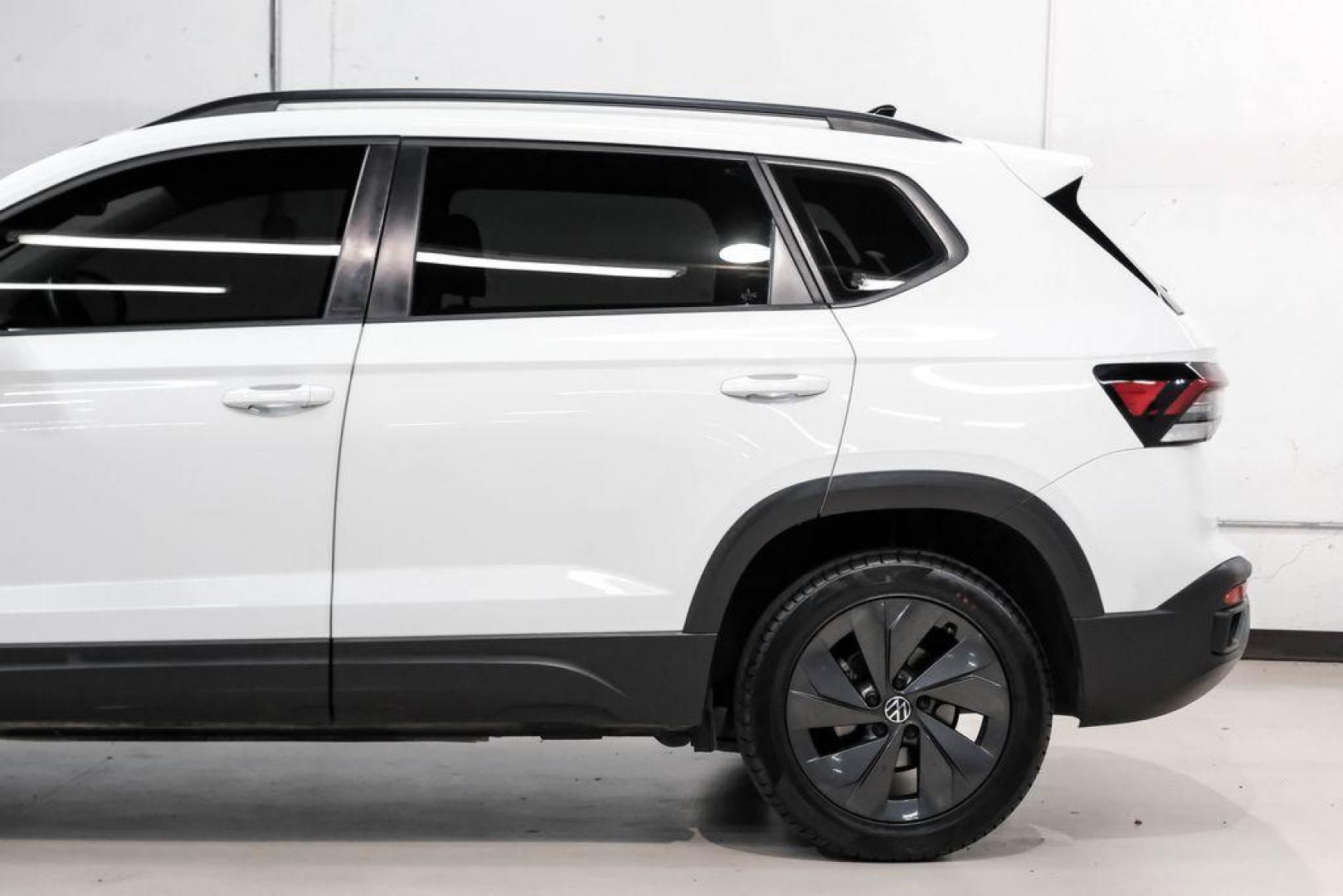 2025 Pure White /Black/White Volkswagen Taos 1.5T S (3VV5C7B2XSM) with an 1.5L I4 Turbocharged DOHC 16V LEV3-SULEV30 174hp engine, Automatic transmission, located at 15300 Midway Rd., Addison, TX, 75001, (972) 702-0011, 32.958321, -96.838074 - Photo#12