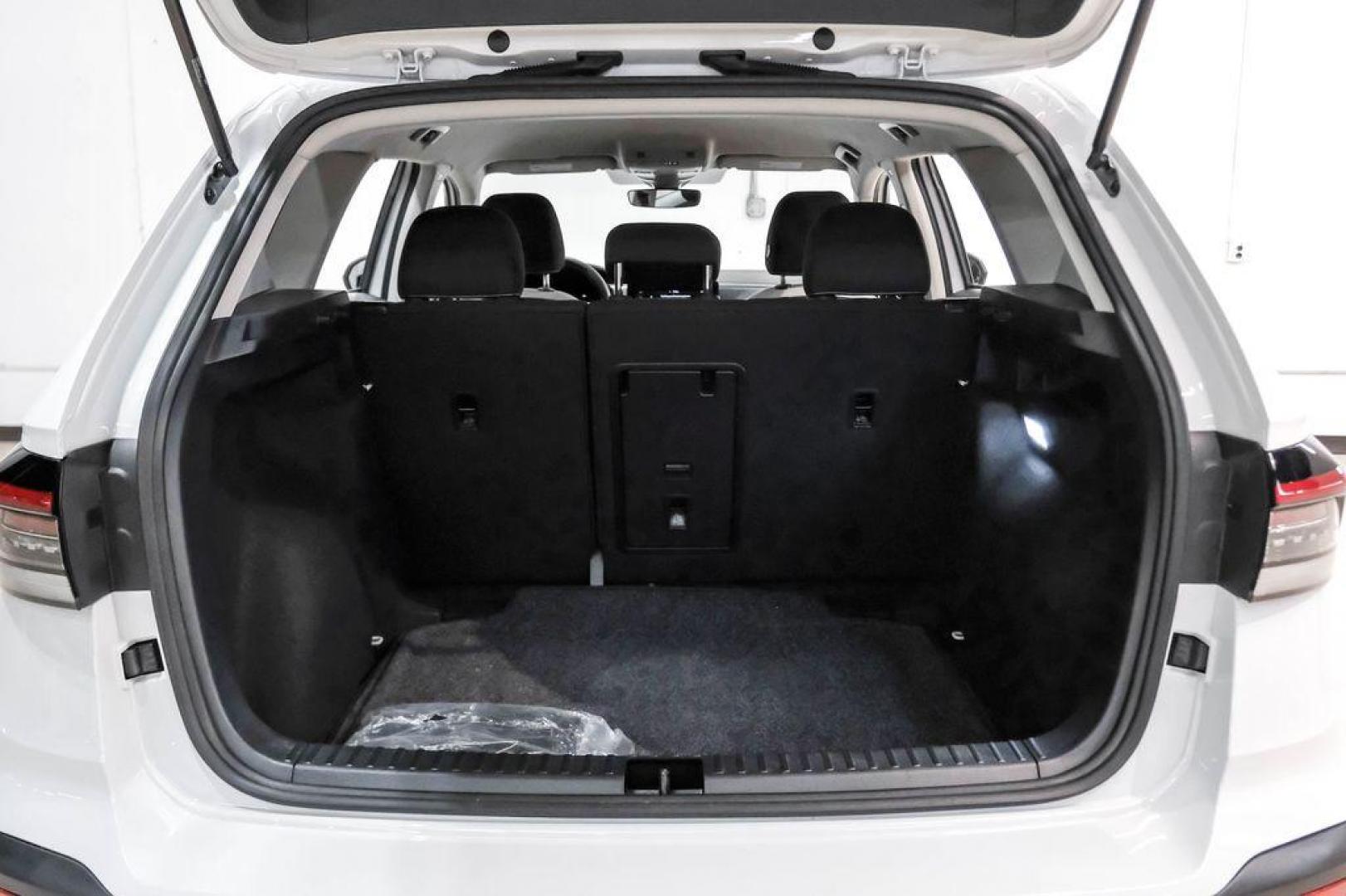 2025 Pure White /Black/White Volkswagen Taos 1.5T S (3VV5C7B2XSM) with an 1.5L I4 Turbocharged DOHC 16V LEV3-SULEV30 174hp engine, Automatic transmission, located at 15300 Midway Rd., Addison, TX, 75001, (972) 702-0011, 32.958321, -96.838074 - Photo#50