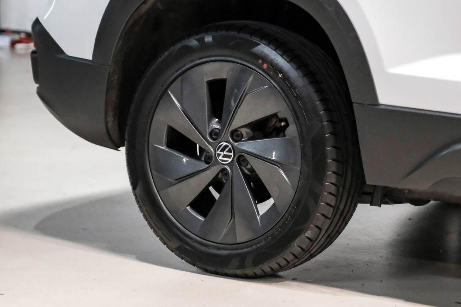 2025 Pure White /Black/White Volkswagen Taos 1.5T S (3VV5C7B2XSM) with an 1.5L I4 Turbocharged DOHC 16V LEV3-SULEV30 174hp engine, Automatic transmission, located at 15300 Midway Rd., Addison, TX, 75001, (972) 702-0011, 32.958321, -96.838074 - Photo#51