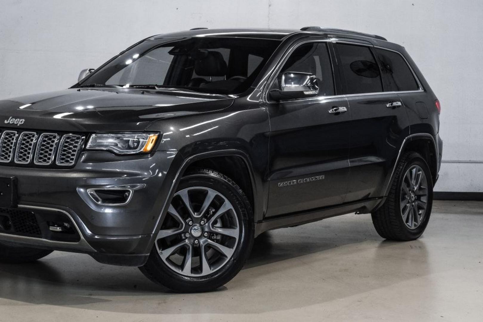 2017 Granite Crystal Metallic Clearcoat /Black Jeep Grand Cherokee Overland (1C4RJECG0HC) with an 3.6L V6 24V VVT engine, Automatic transmission, located at 15300 Midway Rd., Addison, TX, 75001, (972) 702-0011, 32.958321, -96.838074 - Photo#6