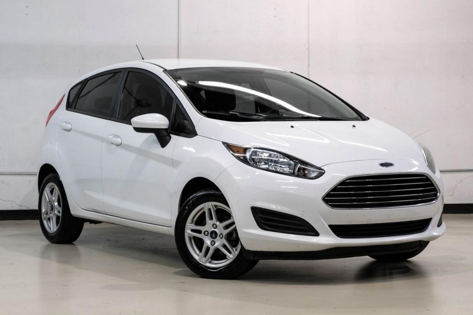 2019 Oxford White /Black Ford Fiesta SE (3FADP4EJXKM) with an 1.6L I4 Ti-VCT engine, Automatic transmission, located at 15300 Midway Rd., Addison, TX, 75001, (972) 702-0011, 32.958321, -96.838074 - Photo#5