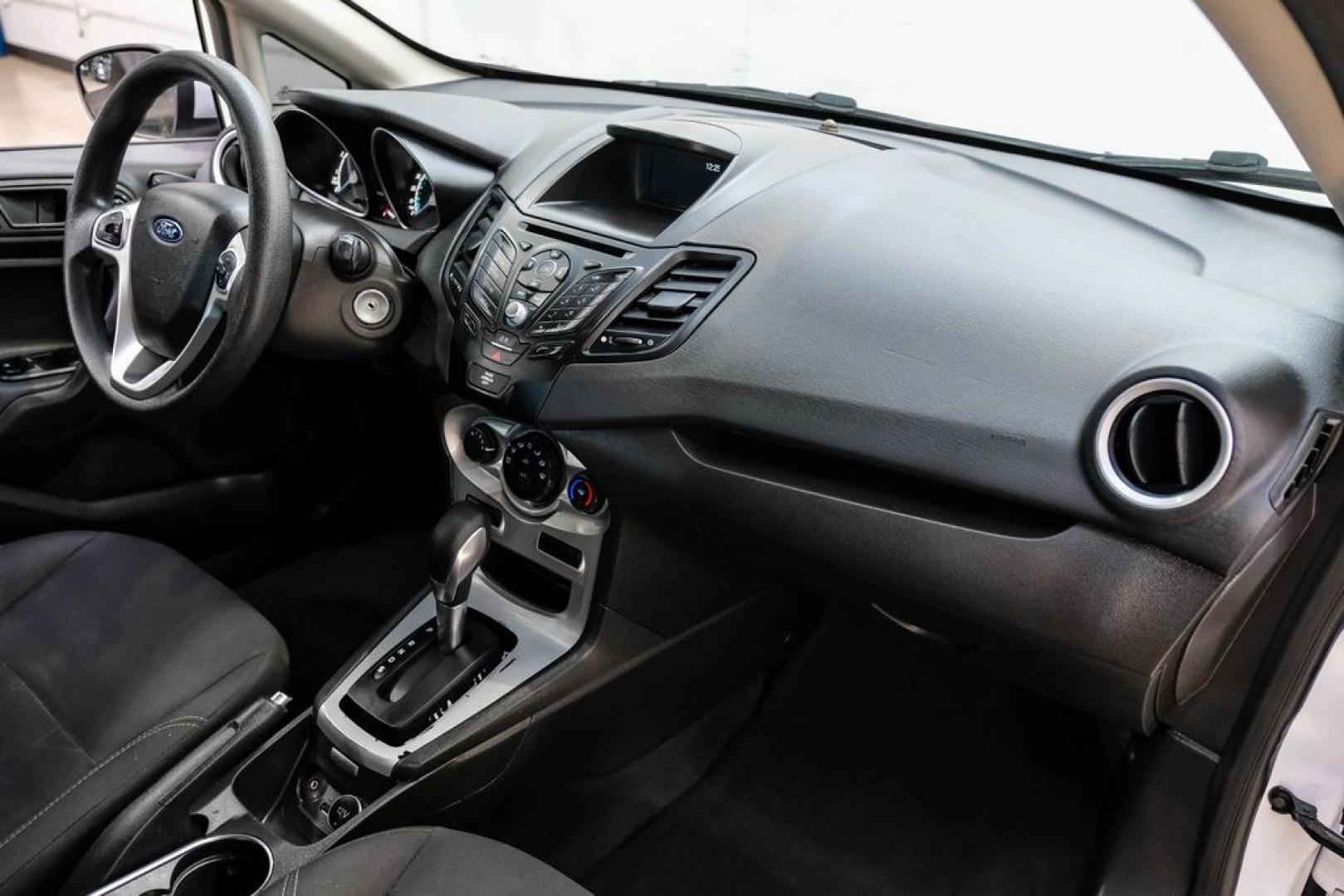 2019 Oxford White /Black Ford Fiesta SE (3FADP4EJXKM) with an 1.6L I4 Ti-VCT engine, Automatic transmission, located at 15300 Midway Rd., Addison, TX, 75001, (972) 702-0011, 32.958321, -96.838074 - Photo#11