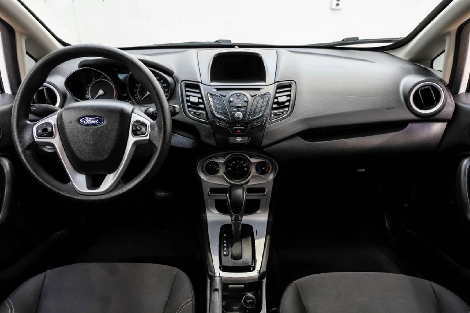 2019 Oxford White /Black Ford Fiesta SE (3FADP4EJXKM) with an 1.6L I4 Ti-VCT engine, Automatic transmission, located at 15300 Midway Rd., Addison, TX, 75001, (972) 702-0011, 32.958321, -96.838074 - Photo#12
