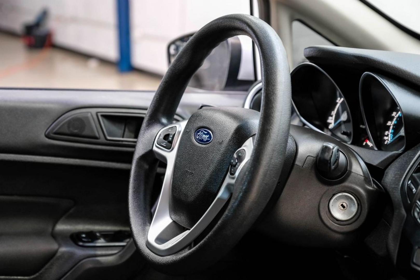 2019 Oxford White /Black Ford Fiesta SE (3FADP4EJXKM) with an 1.6L I4 Ti-VCT engine, Automatic transmission, located at 15300 Midway Rd., Addison, TX, 75001, (972) 702-0011, 32.958321, -96.838074 - Photo#13